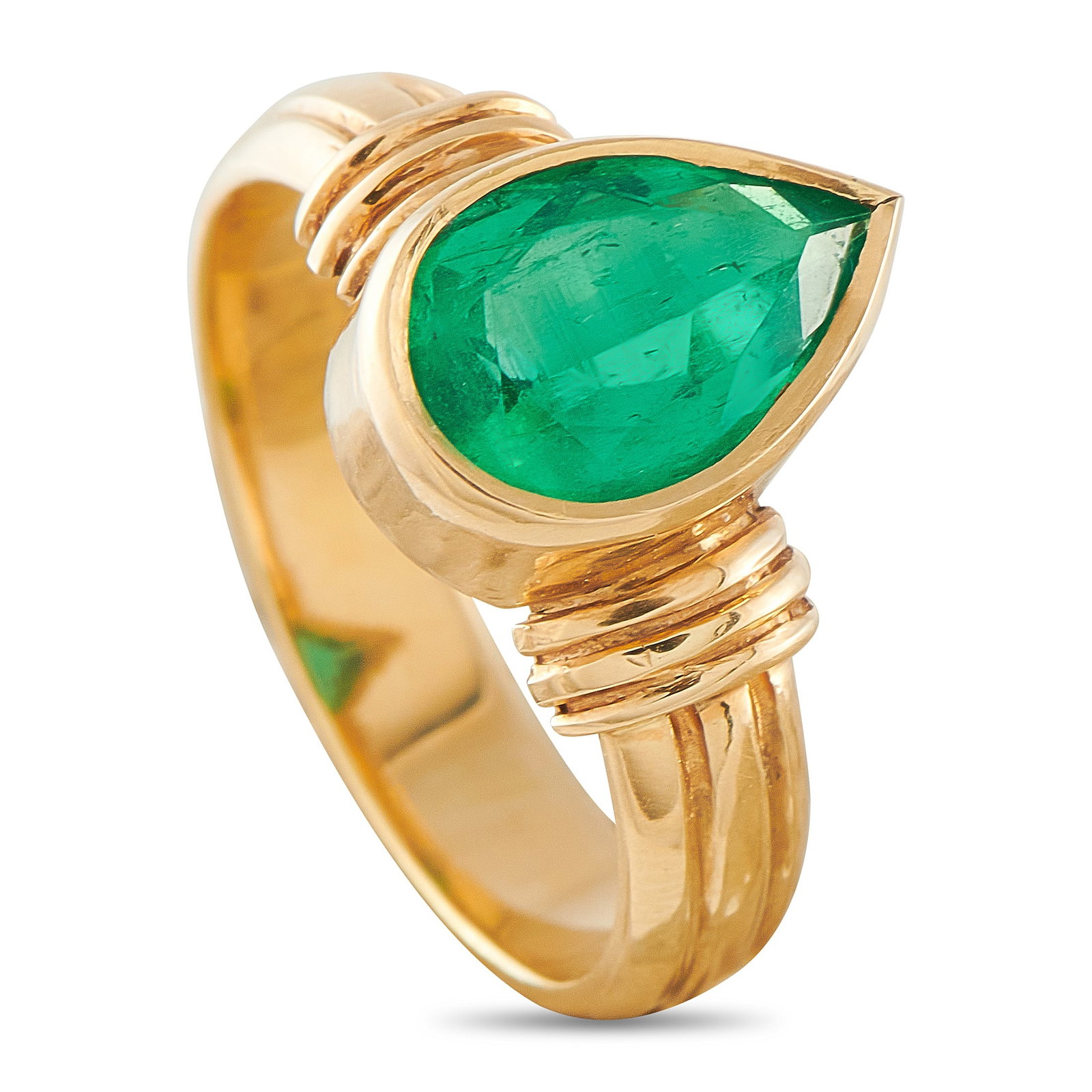 18K Yellow Gold 1.75ct Colombian Emerald Ring: An opulent design makes this luxury ring simply unforgettable. Crafted from lustrous 18K Yellow Gold, a pear-shaped 1.75 carat Colombian Emerald makes a statement at the center. It features a 4mm wide