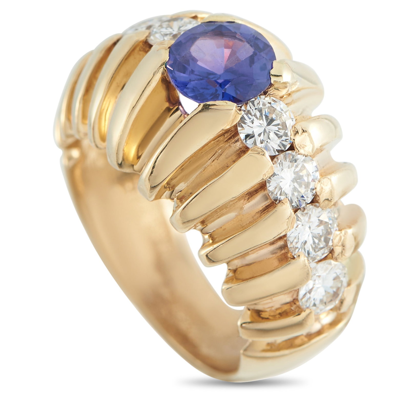 14K Yellow Gold 1.12ct Diamond and Sapphire Ring: A dynamic 14K Yellow Gold setting makes this luxury ring impossible to ignore. Filled with exquisite detail, it includes a vibrant 1.05 carat Sapphire center stone and Diamond accents totaling 1.12