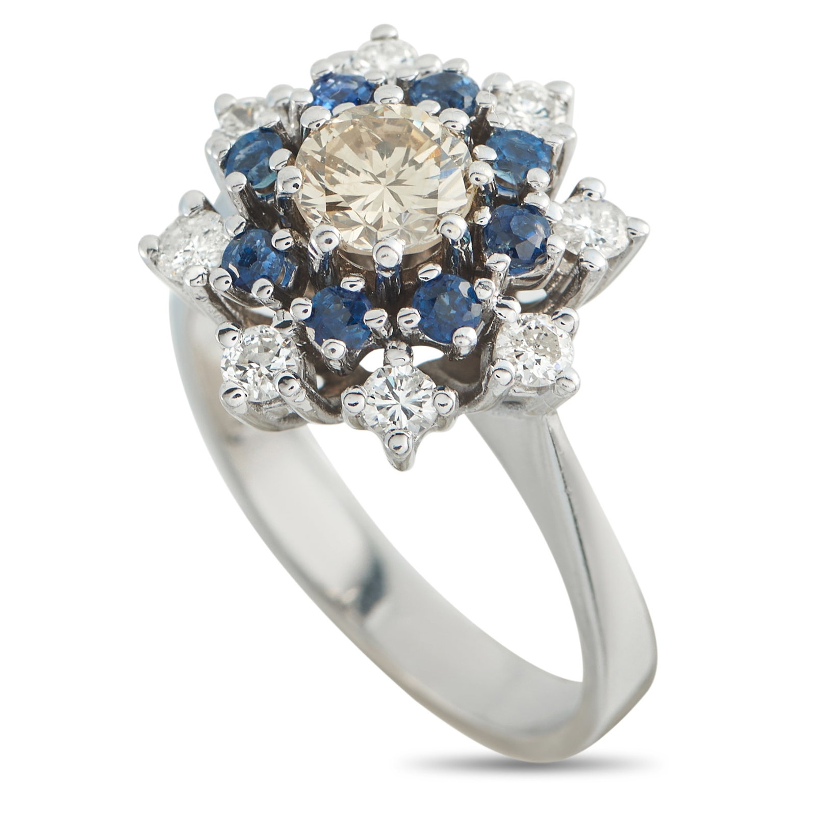 14K White Gold 0.71ct Diamond Ring: This luxury ring is full of dynamic details. The opulent design effortlessly catches the light and beautifully showcases the stunning 0.71 carat Diamond center stone. Set in 14K White Gold, it feature