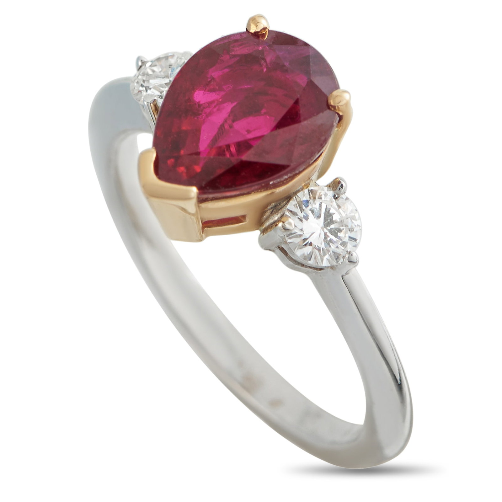 18K White and Rose Gold 0.30ct Diamond and Ruby Ring: An understated design makes this ring incredibly chic. Simple and elegant, a 2.36 carat pear-shaped Ruby adds a pop of color to the center of the design. Diamonds with a total weight of 0.30 carats