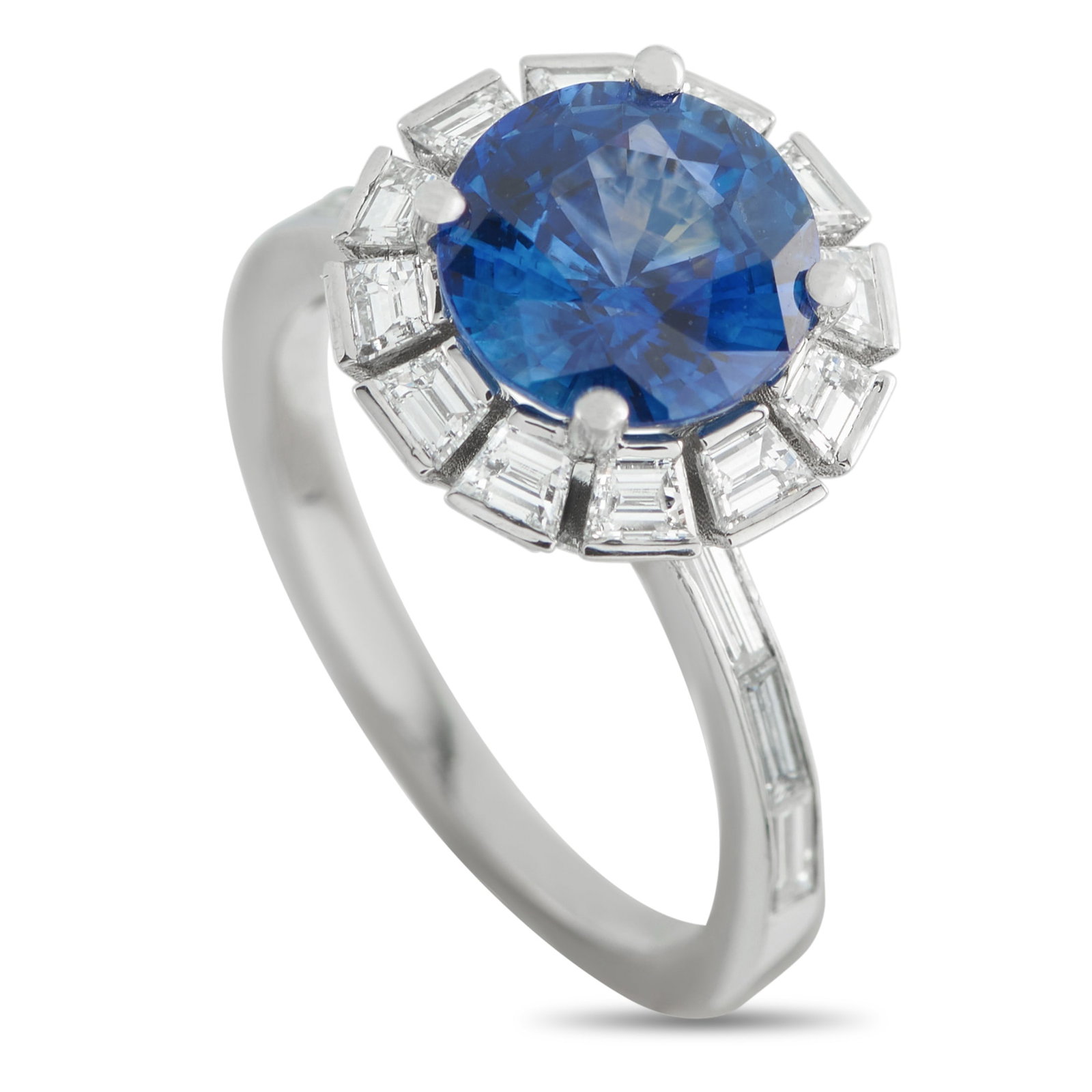 Platinum 1.60ct Diamond and Sapphire Ring: A sleek, contemporary design makes this luxury ring an instant classic. The simple Platinum setting boldly displays the 2.57 carat Sapphire centers stone, which is surrounded by a halo of sparkling