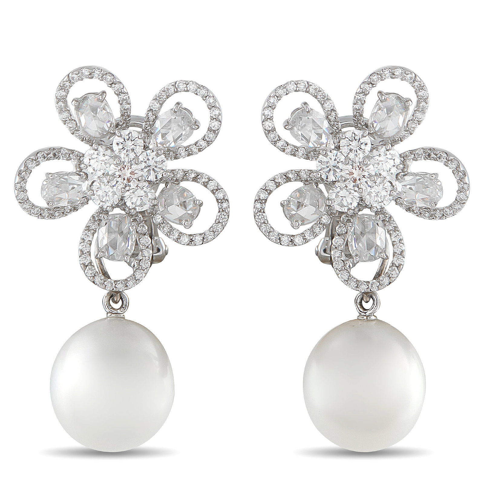 Assael 18K White Gold 5.24ct Diamond and Pearl Clip: Diamonds with a total weight of 5.24 carats make these Assael earrings instantly captivating. Crafted from 18K White Gold, luminous 14.3mm pearl accents dangle below the delicate flower-shaped setting