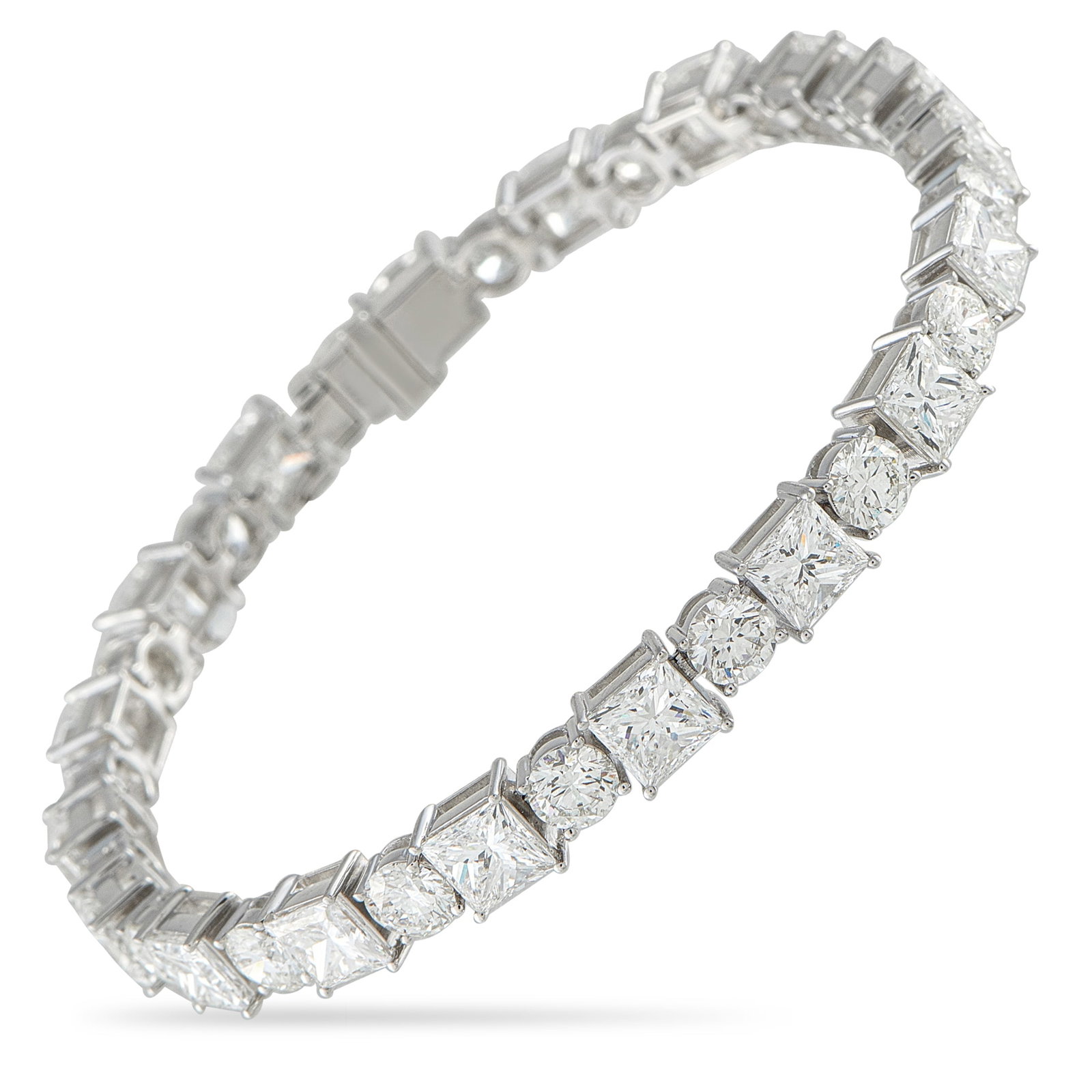 18K White Gold 19.50ct Diamond Tennis Bracelet: Round-cut Diamonds totaling 6.30 carats and princess-cut Diamonds totaling 13.20 carats alternate on this exquisite tennis bracelet. Incredibly chic, it’s crafted from 18K White Gold and measures 7.