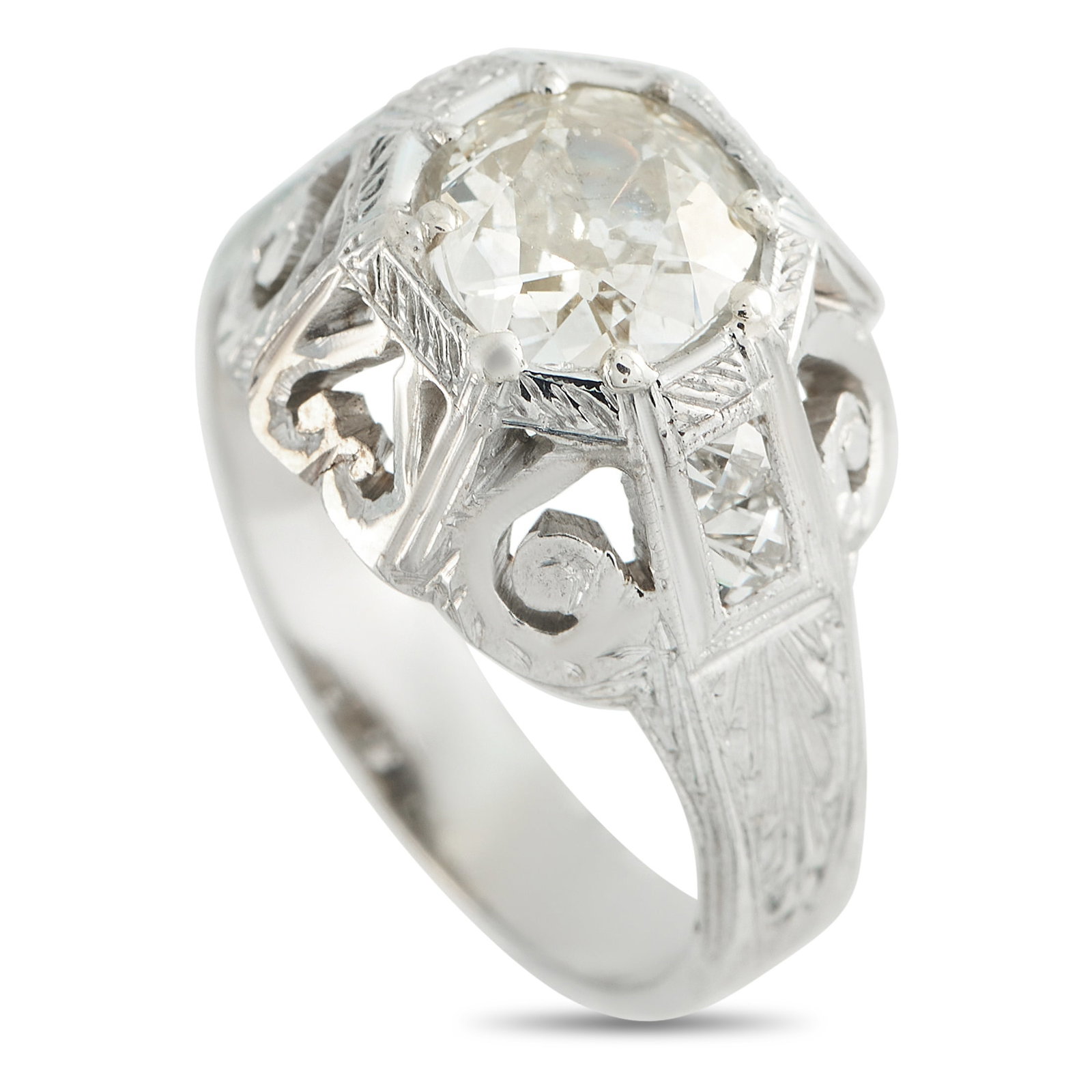 18K White Gold 1.41ct Diamond Ring: This luxury ring exudes Art Deco elegance. Set in 18K White Gold, the detailed setting is elevated by a sparkling 1.41 carat Diamond center stone. A 4mm wide band and a 6mm top height ensure this piec