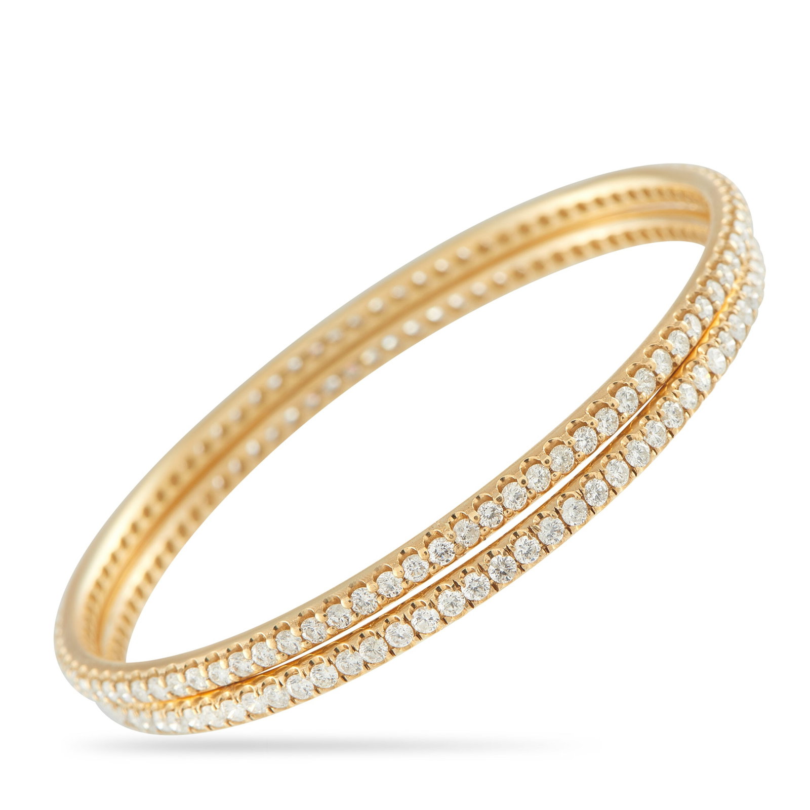 18K Yellow Gold 4.64ct Diamond Set: Sold as a set of 2, these bangle bracelets are simple, elegant, and incredibly luxurious. Complete with Diamonds totaling 4.64 carats, pair them together to create a stylish stacked look. Each bracele