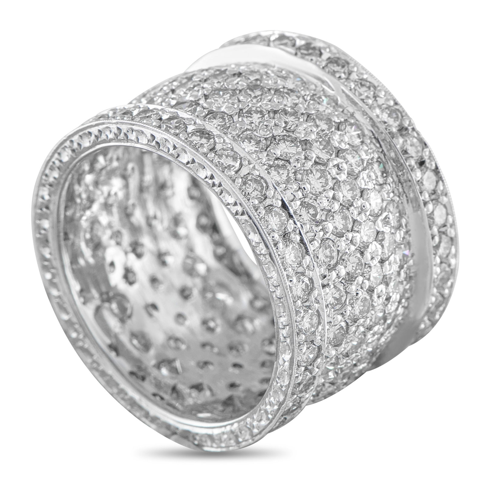 18K White Gold 5.50ct Diamond Ring: Diamonds with a total weight of 5.50 carats make this ring a dazzling addition to any jewelry collection. Bold and incredibly impressive, the simple 18K White Gold setting measures 16mm wide and featu
