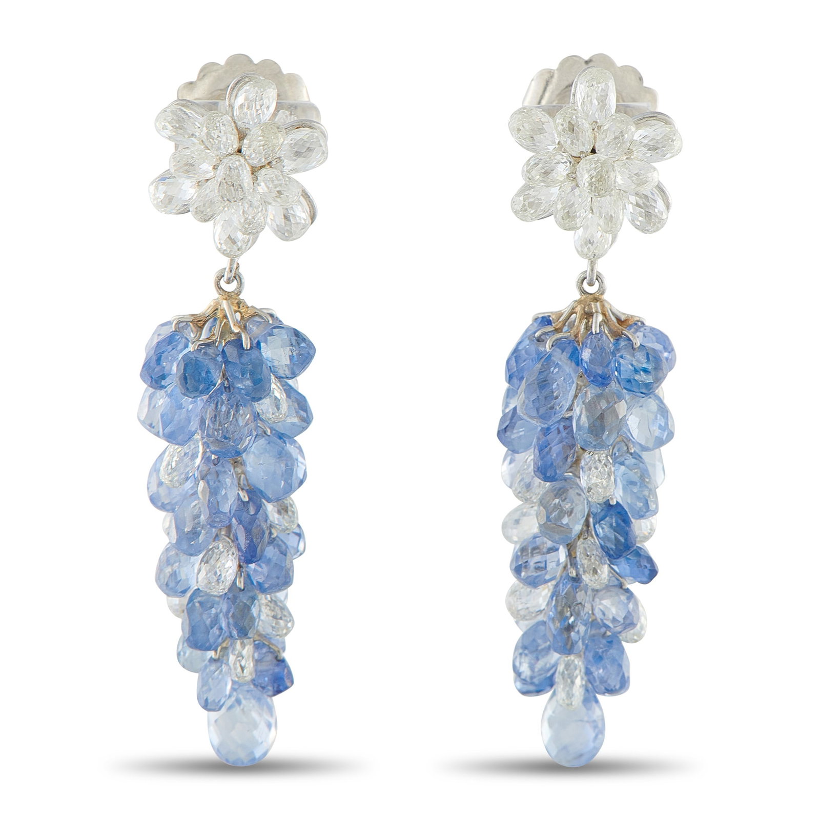 18K White Gold 5.0ct Diamond and Sapphire Dangle Earrings: These uniquely elegant earrings are simply spectacular. At the base, Diamond briolettes with a total weight of 5.0 carats shine brightly every time they catch the light. Suspended below, a cascade of 