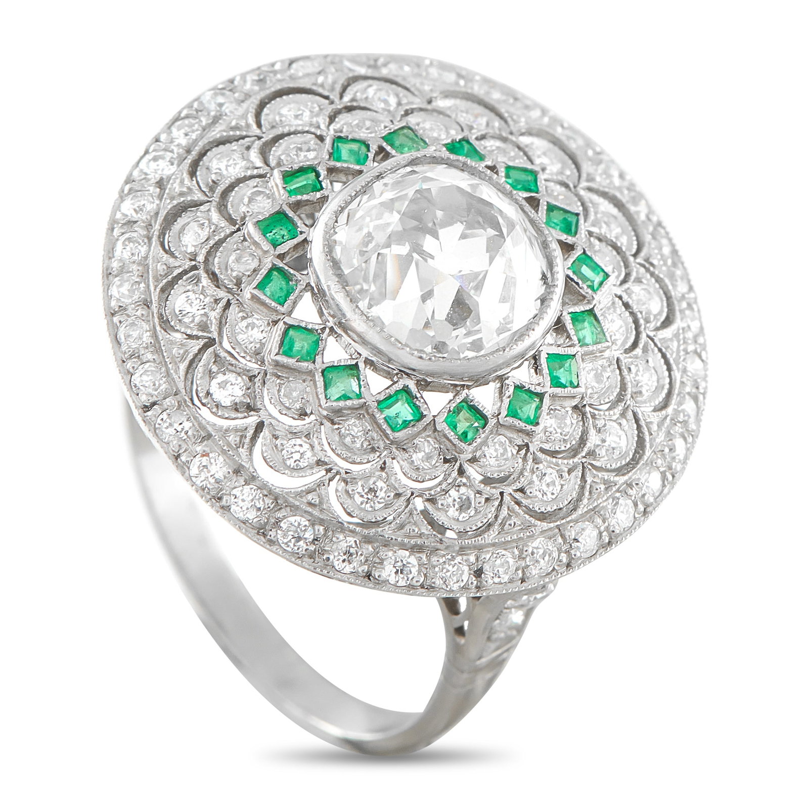 Platinum 2.75ct Diamond and Emerald Ring: This dazzling ring is a breathtaking piece that will continually impress. At the center of the circular Platinum setting, a 2.10 carat Diamond with L color and SI clarity makes a statement. Additional