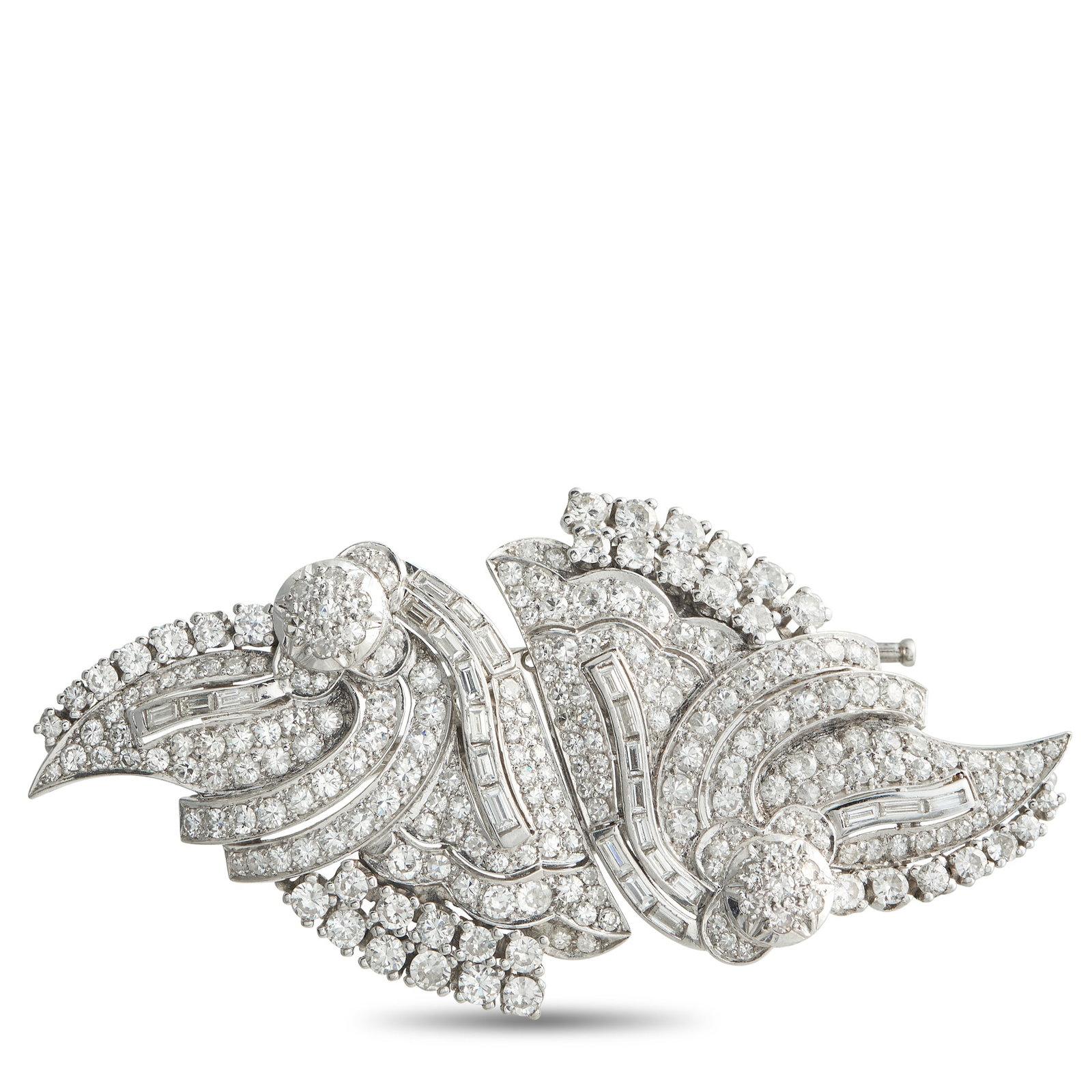 Platinum 7.50ct Diamond Brooch: This luxury brooch is filled with dramatic details. Along with an intricate Platinum setting, this piece features a dazzling array of Diamonds totaling 7.50 carats. It measures 1.50” long by 3.0