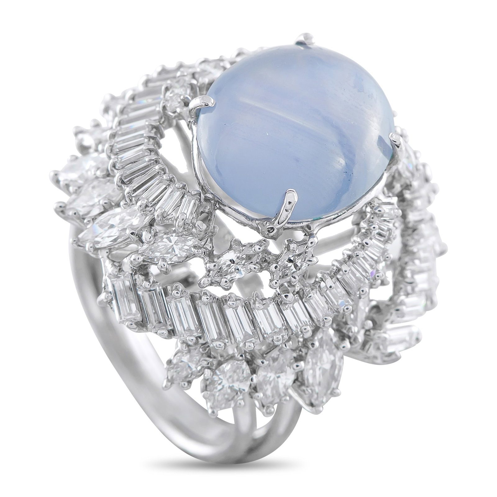 Platinum 3.85ct Diamond and Sapphire Ring: A captivating 10.0 carat Sapphire cabochon makes a statement at the center of this impressive luxury ring. Set in Platinum, Diamonds with a total weight of 3.85 carats surround the center stone and