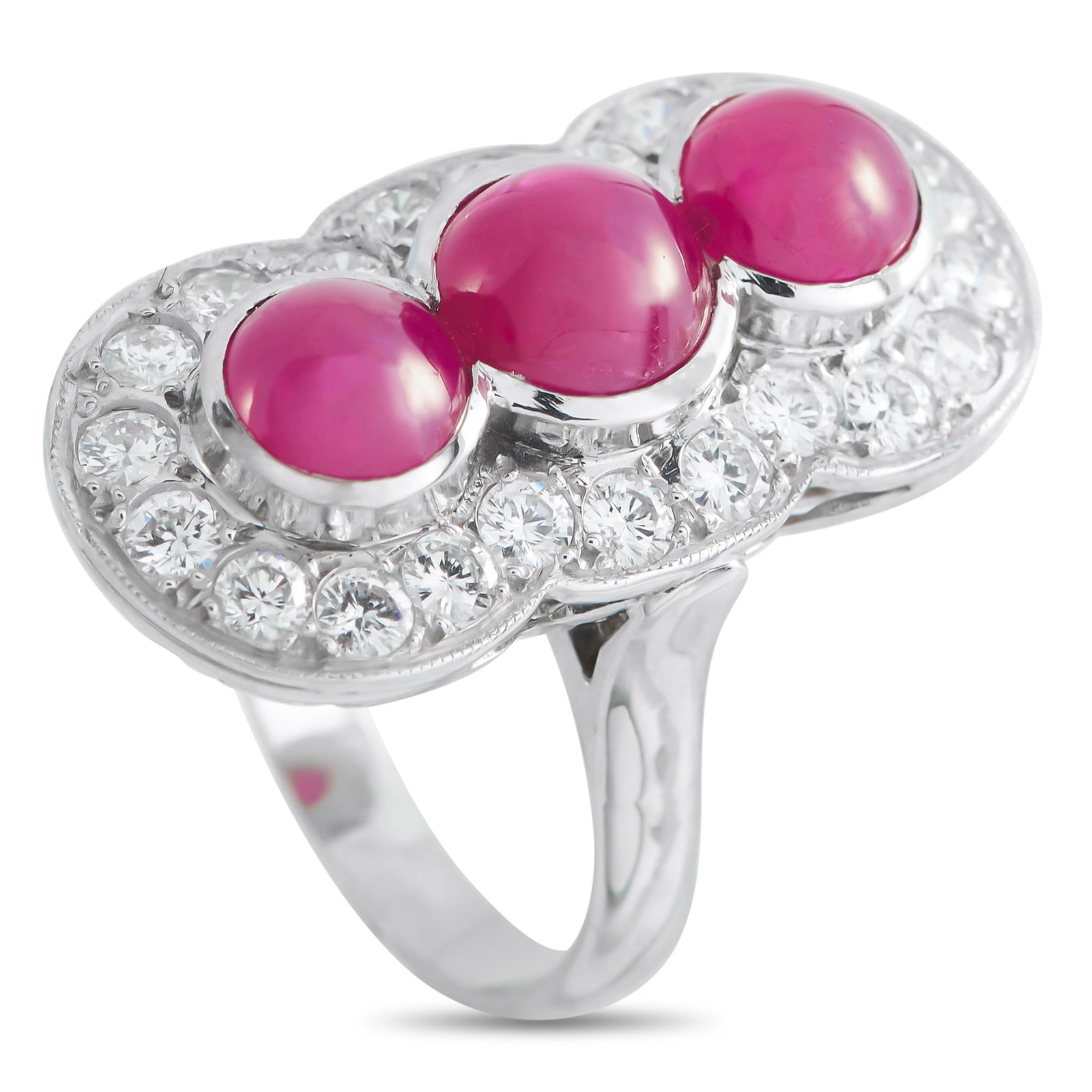 Platinum 1.85ct Diamond and Ruby Ring: A trio of Ruby cabochons with a total weight of 3.25 carats make a statement at the center of this dynamic ring. The symmetrical Platinum setting offers Art Deco elegance, while Diamond accents totali