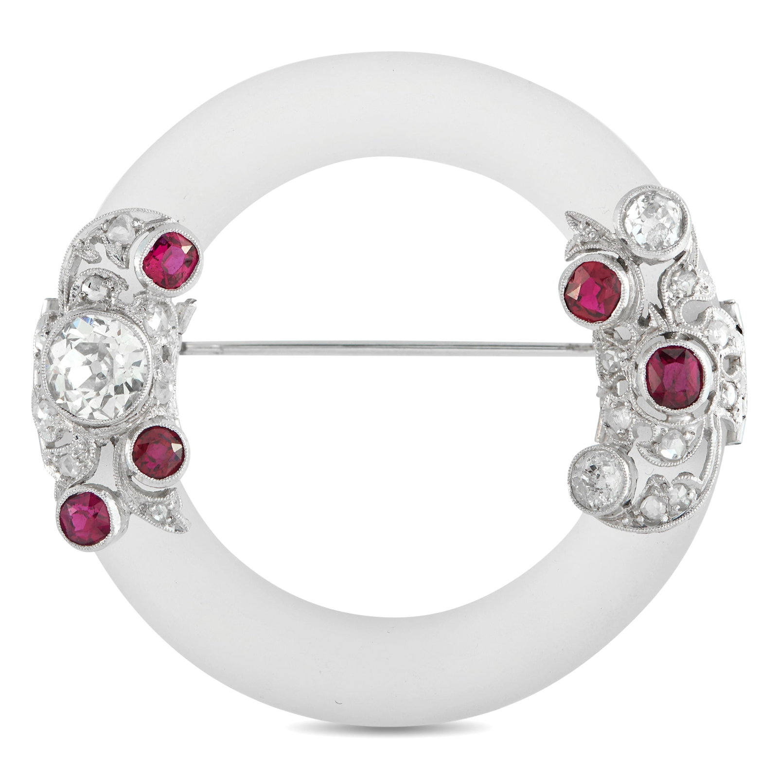 Art Deco 18K White Gold 1.50ct Diamond and Ruby Brooch: This Art Deco brooch is unlike anything you’ve seen before. Crafted from 18K White Gold, filigree metalwork provides this piece with plenty of intricate details. Diamonds totaling 1.50 carats and Ru