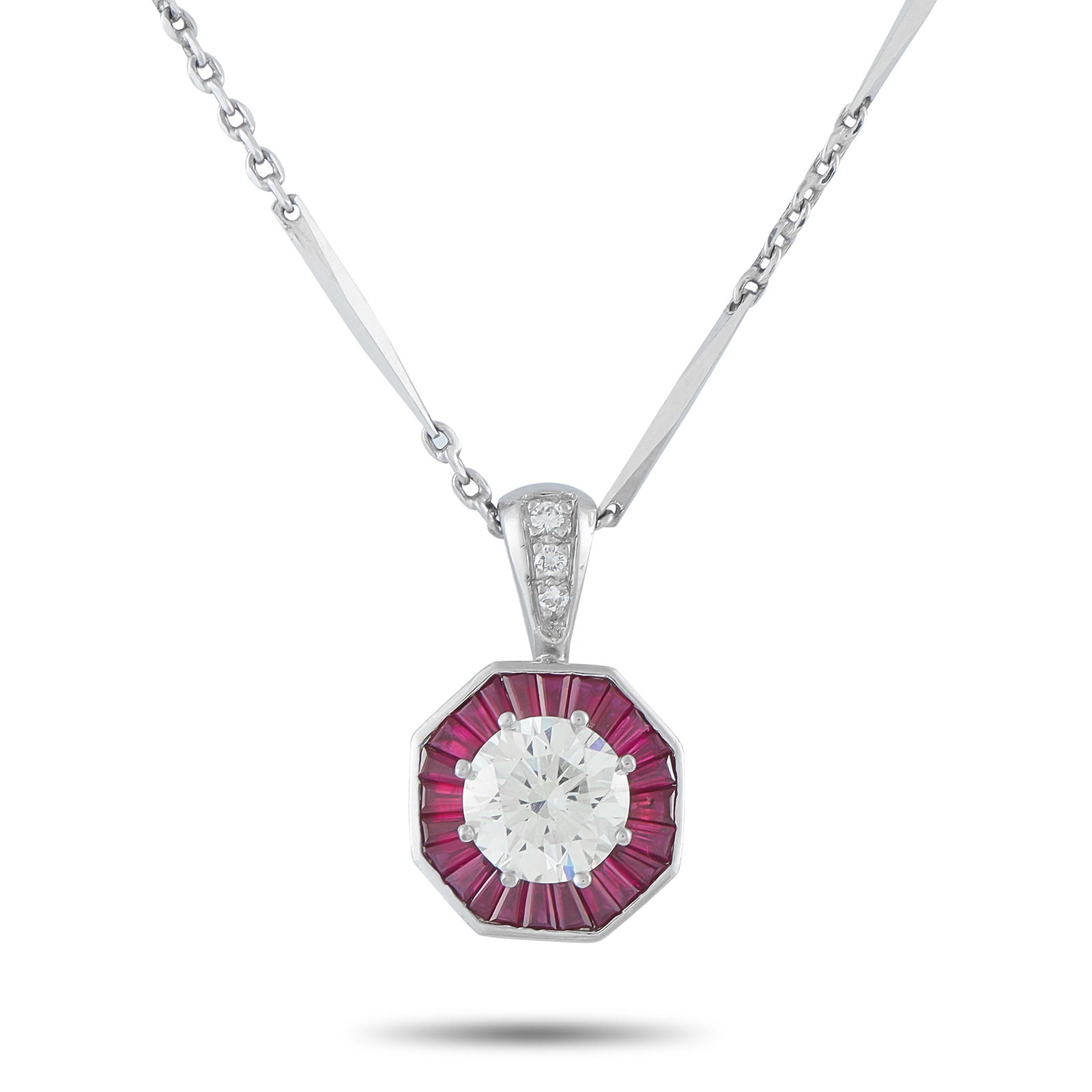 Platinum 2.21ct Diamond and Ruby Pendant: This necklace is undeniably chic. A 2.21 carat Diamond with K color and SI1 clarity sparkles at the center of this piece’s pendant. Vibrant Ruby gemstones with a total weight of 1.90 carats