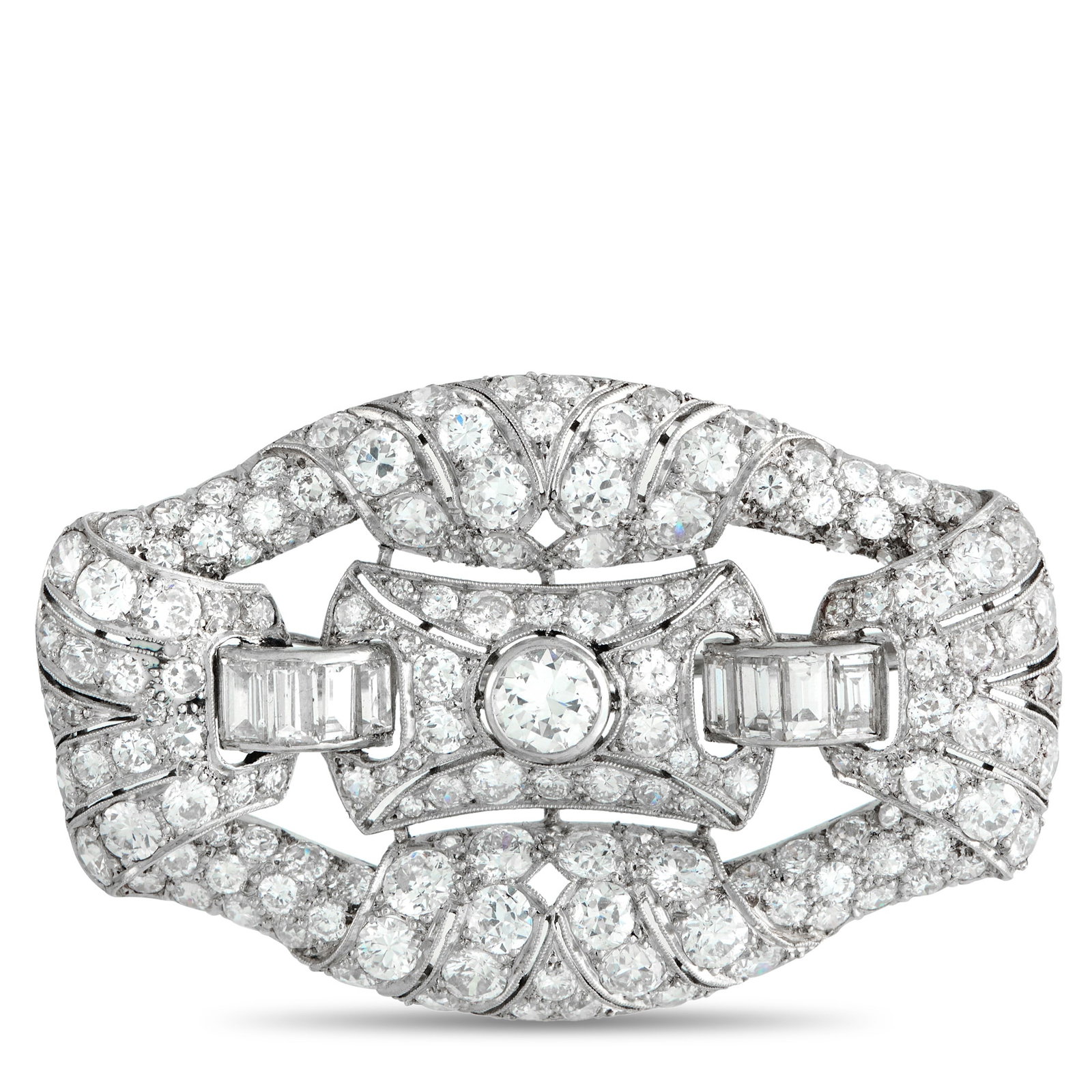 Platinum 5.04ct Diamond Art Deco Brooch: Rooted in the decorative language of the Art Deco period, this platinum brooch presents a buckle-like profile measuring 1.38 by 2 inches. Diamonds totaling 5.04 carats trace the form, defining its out