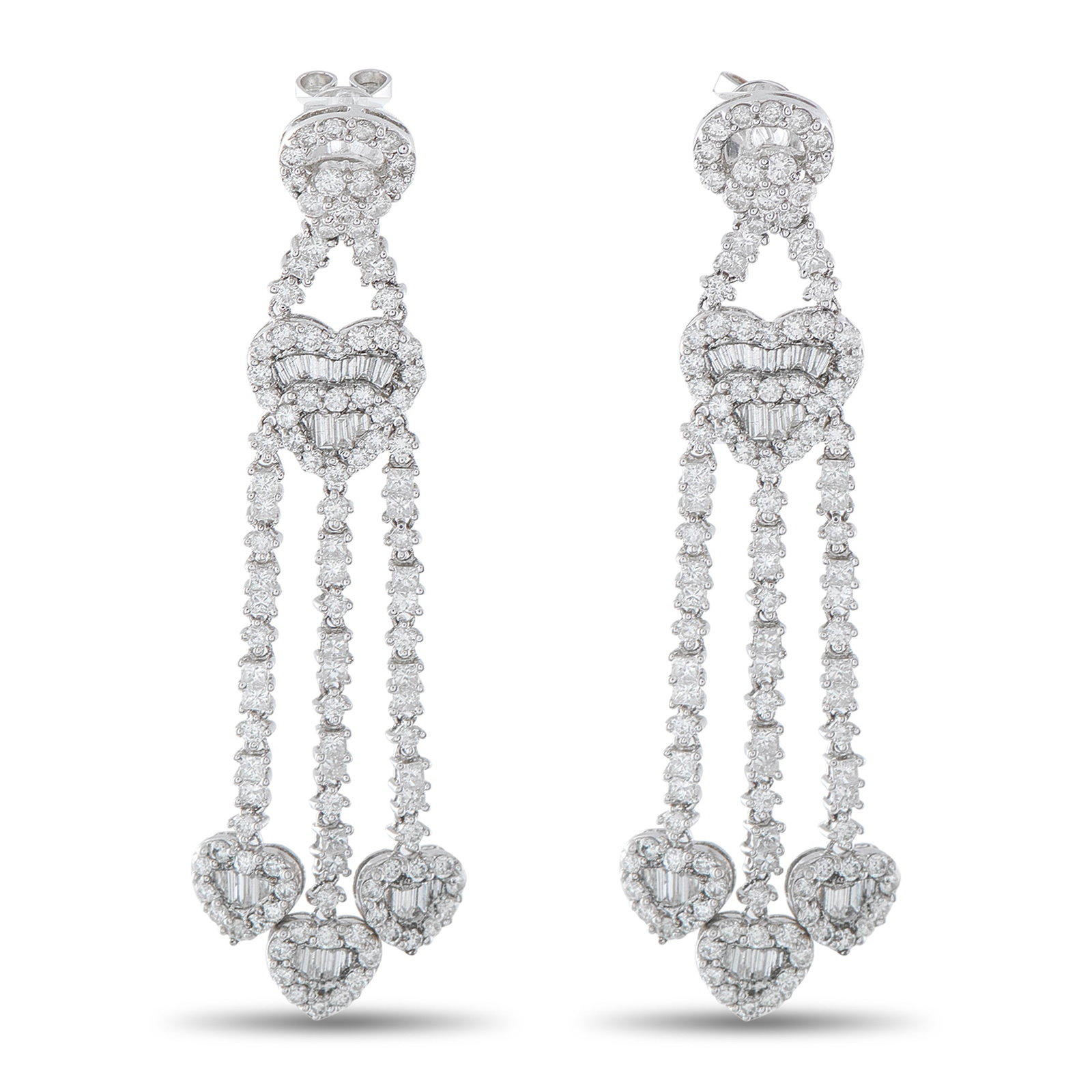 18K White Gold 3.60ct Diamond Heart Drop Earrings: Crafted in 18K white gold, these drop earrings are built around a vertical composition of heart-shaped diamond clusters. Each heart combines round and baguette-cut diamonds, arranged to emphasize shap