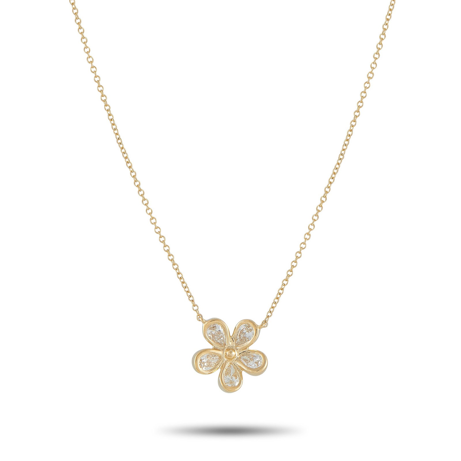 18K Yellow Gold 0.75ct Diamond Flower Necklace: This necklace is incredibly charming. Suspended at the center of a 17.50” chain, a delicate floral pendant makes a statement thanks to sparkling Diamonds with a total weight of 0.75 carats. The 