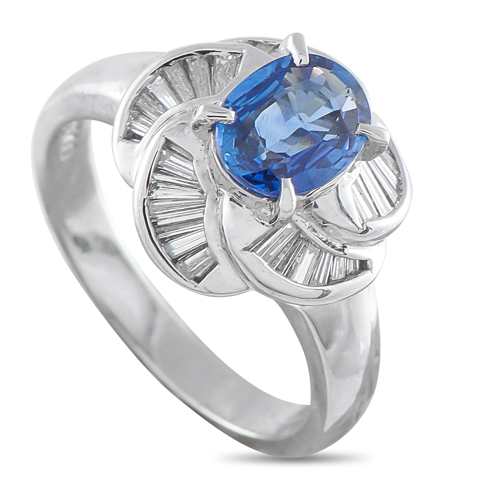 Platinum 0.43ct Diamond and Blue Sapphire Pinwheel Halo Ring: The design of this ring delivers a beautiful sense of motion and intense brilliance. At its heart is a rich blue 1.10-carat oval sapphire, encircled by an innovative pinwheel halo composed of tapering