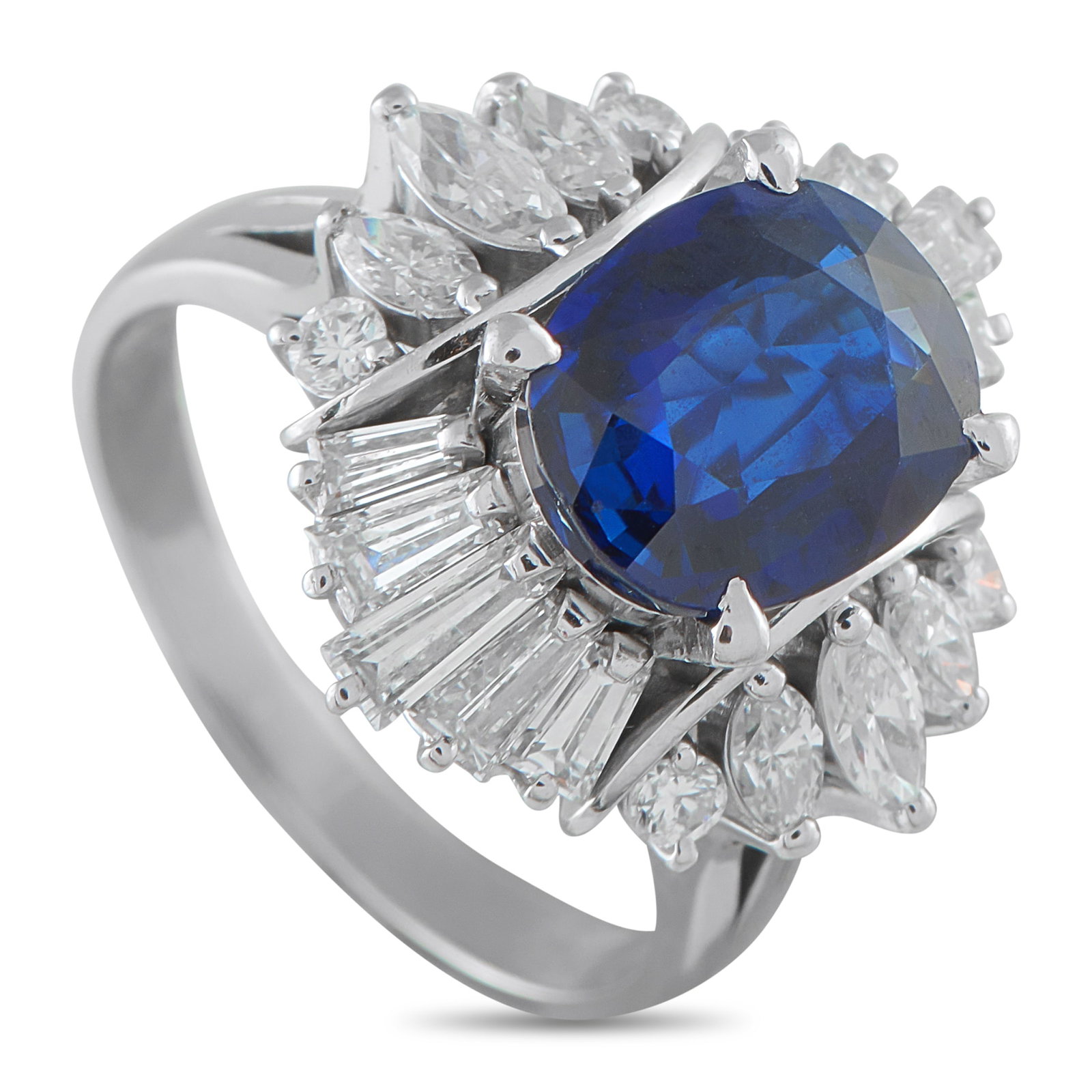 Platinum 1.37ct Diamond and Sapphire Ring: This ring’s 3.31-carat sapphire takes the spotlight within a radiant ballerina halo of baguette, marquise, and round diamonds. Raised 13 millimeters high on a double-split shank, the ring’s
