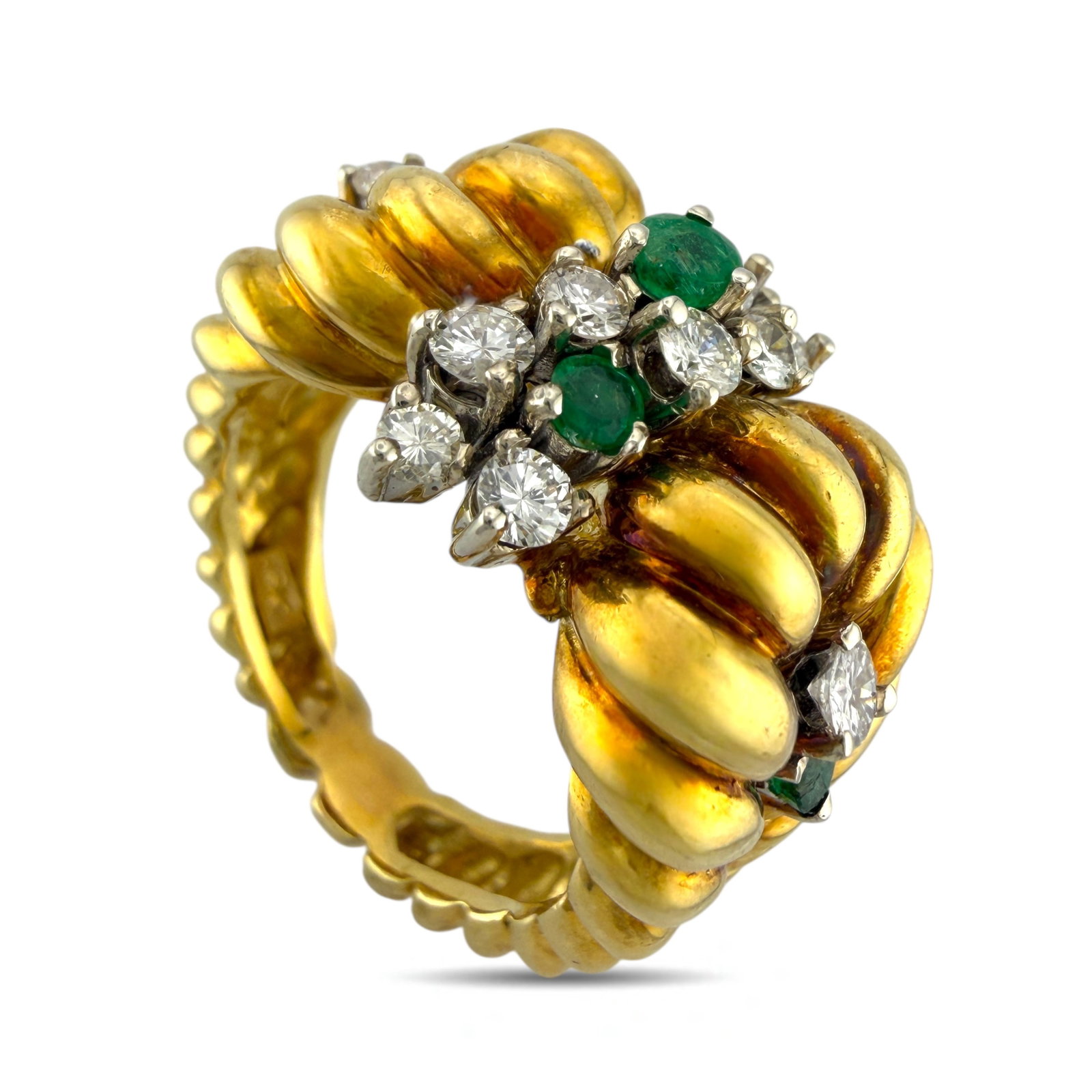 18K Yellow Gold 0.48ct Diamond and Emerald Cocktail Ring: 18K Yellow Gold 0.48ct Diamond and Emerald Cocktail Ring A striking vintage cocktail ring crafted in 18 karat yellow gold, designed with an elegant twisted motif that gives the piece depth and