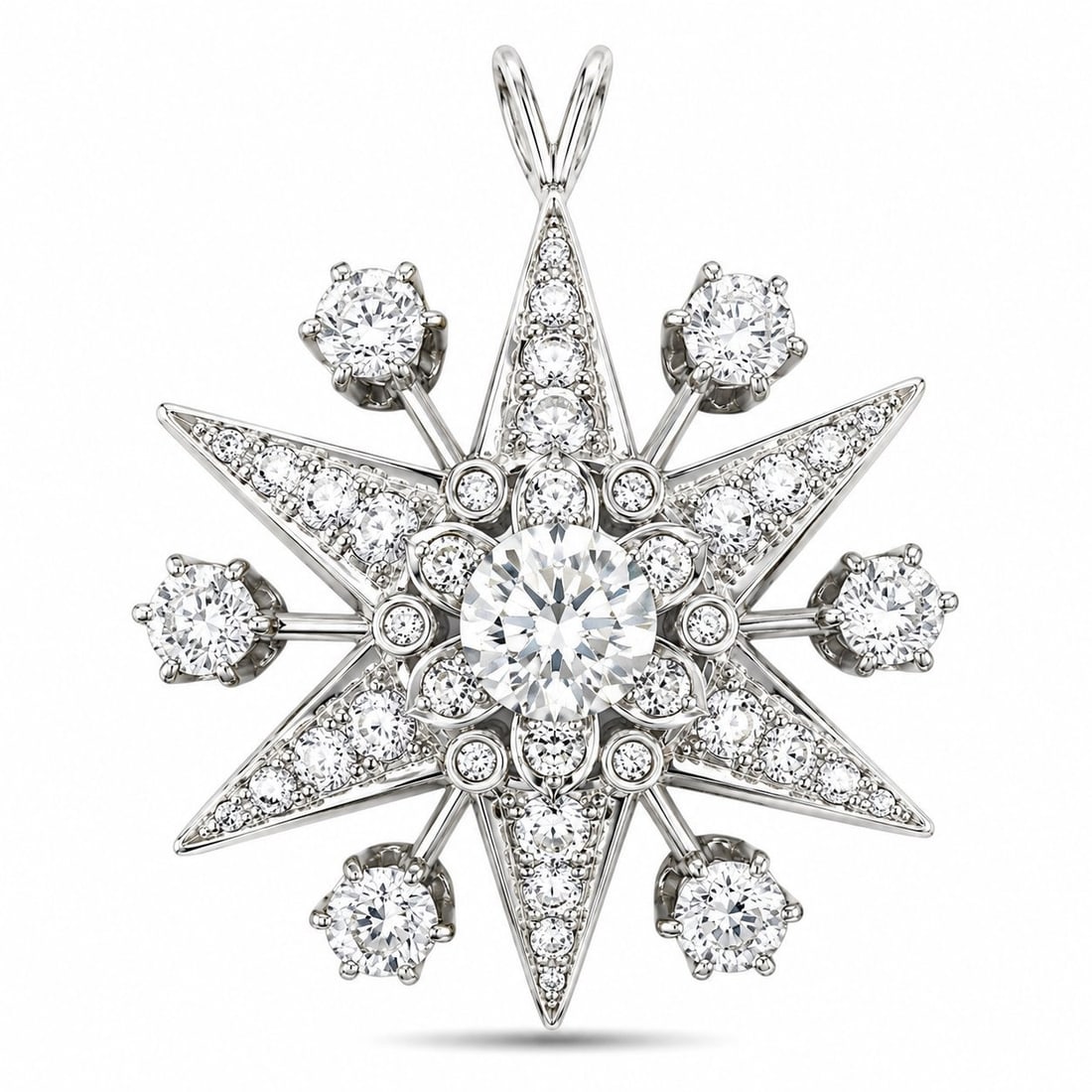 18K White Gold 6.30ct Diamond Star Pendant: 18K White Gold 6.30ct Diamond Star Pendant 18K white gold diamond pendant designed in a star motif, featuring a large diamond set between each point of the star. The piece has a dimensional openwork d