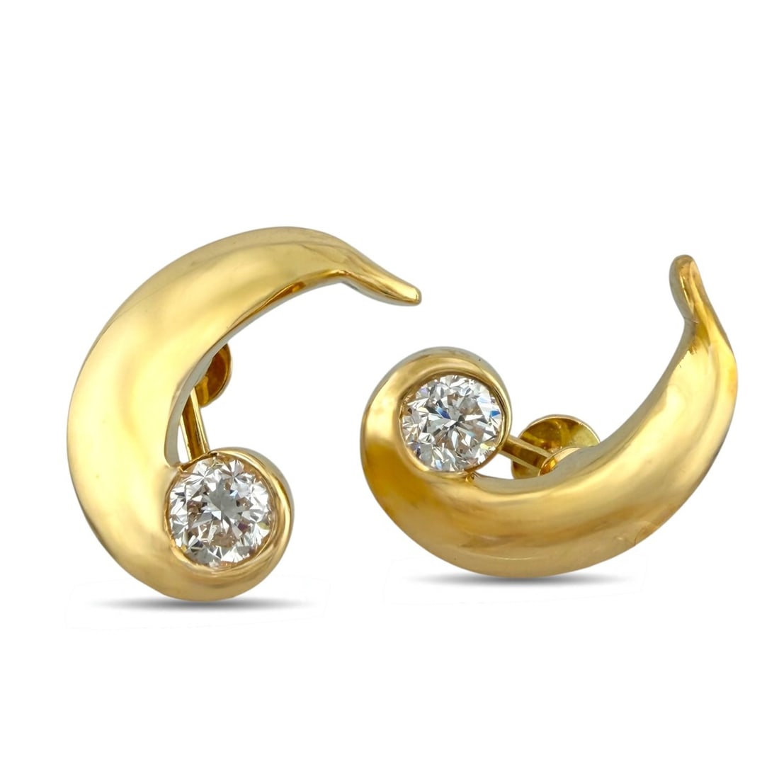 14K Yellow Gold 1.5ct Diamond Spiral Earrings: 14K Yellow Gold 1.5ct Diamond Spiral Earrings A bold and elegant pair of spiral earrings designed with a sculptural flow that draws attention from every angle. Each earring is finished with a prominen