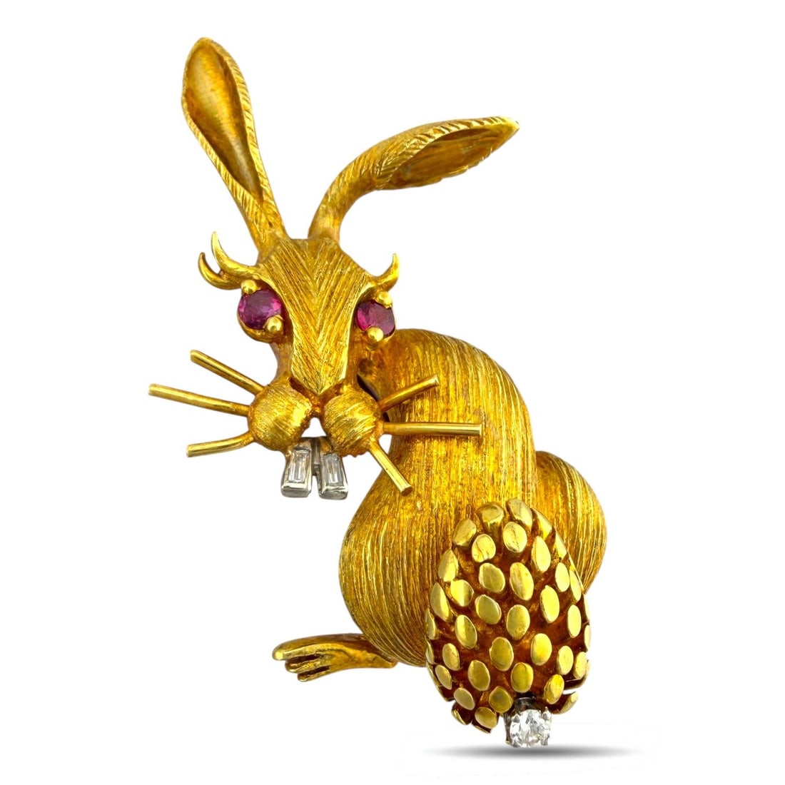 Hammerman Brothers 18K Yellow Gold Diamond and Ruby Bunny Brooch: Hammerman Brothers 18K Yellow Gold 0.04ct Diamond and Ruby Bunny Brooch A charming and finely sculpted brooch crafted in rich 18 karat yellow gold, depicting an elegant bunny adorned with vivid ruby