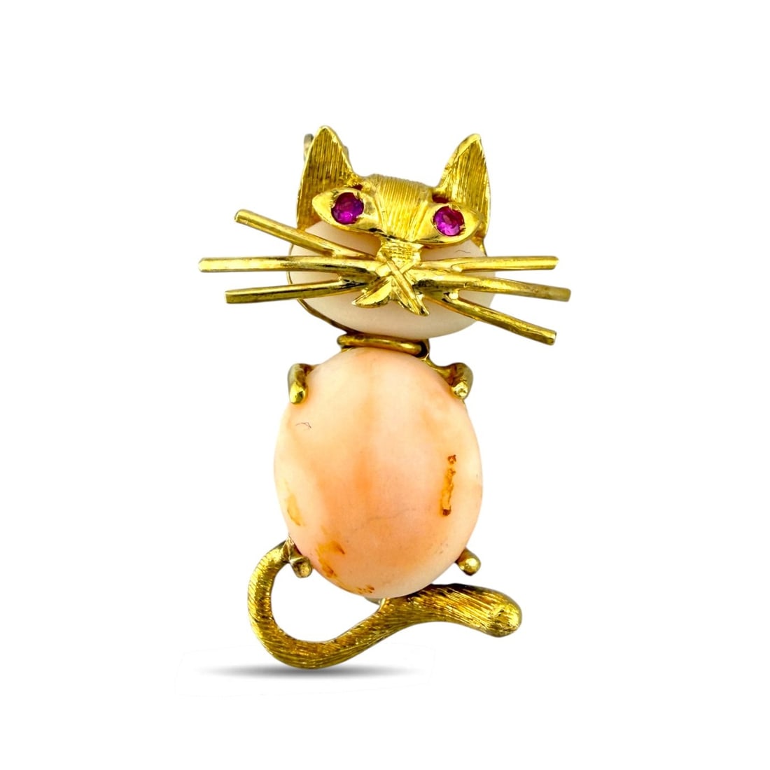 18K Yellow Gold Italian Coral and Ruby Kitten Brooch: 18K Yellow Gold Italian Coral and Ruby Kitten Brooch A charming Italian brooches crafted in 18 karat yellow Gold, designed as a sweet little kitten with playful character and fine detail. The body is 