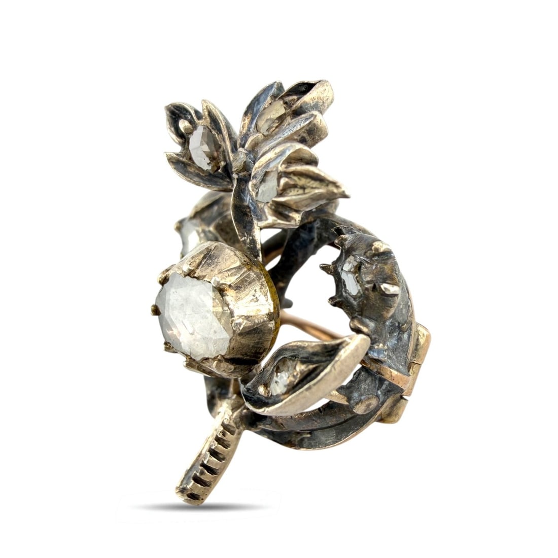 14K Rose Gold 0.3ct Diamond Flower Motif Antique Brooch: 14K Rose Gold 0.3ct Diamond Flower Motif Antique Brooch A delicate antique brooches crafted in 14 karat rose Gold, designed in a graceful flower motif. The piece is set with old cut diamonds that give