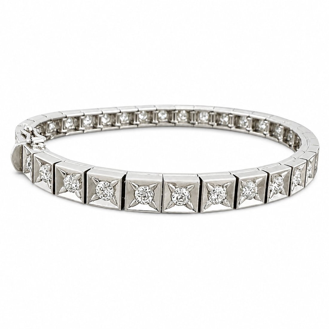 18K White Gold 5.0ct Diamond Tennis Bracelet: 18K White Gold 5.0ct Diamond Tennis Bracelet This refined tennis bracelet is crafted in 18 karat white gold and set with a continuous row of diamonds. Each diamond measures approximately 3 mm, giving 