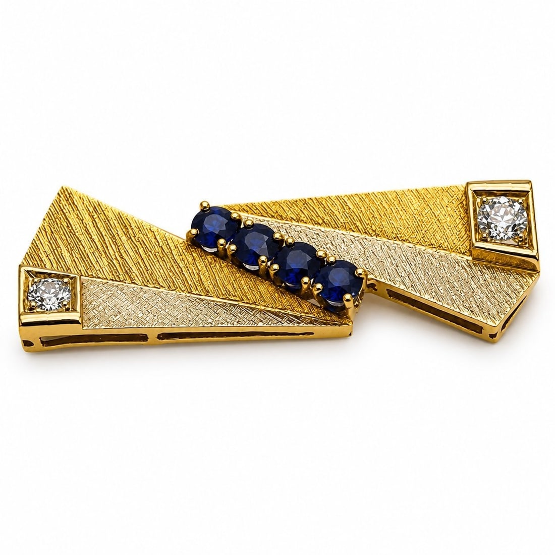 Large 18k Gold Diamond Sapphire Brooch: Large 18k Gold Diamond Sapphire Brooch Sizes: - 5.5cm x 2.5cm Weight: - 11.4 grams Diamond: - Natural 2 large diamonds, 0.35 ct, each 4.5mm. Total 0.70 Carats Sapphires: - 4 large, each 4mm. Total