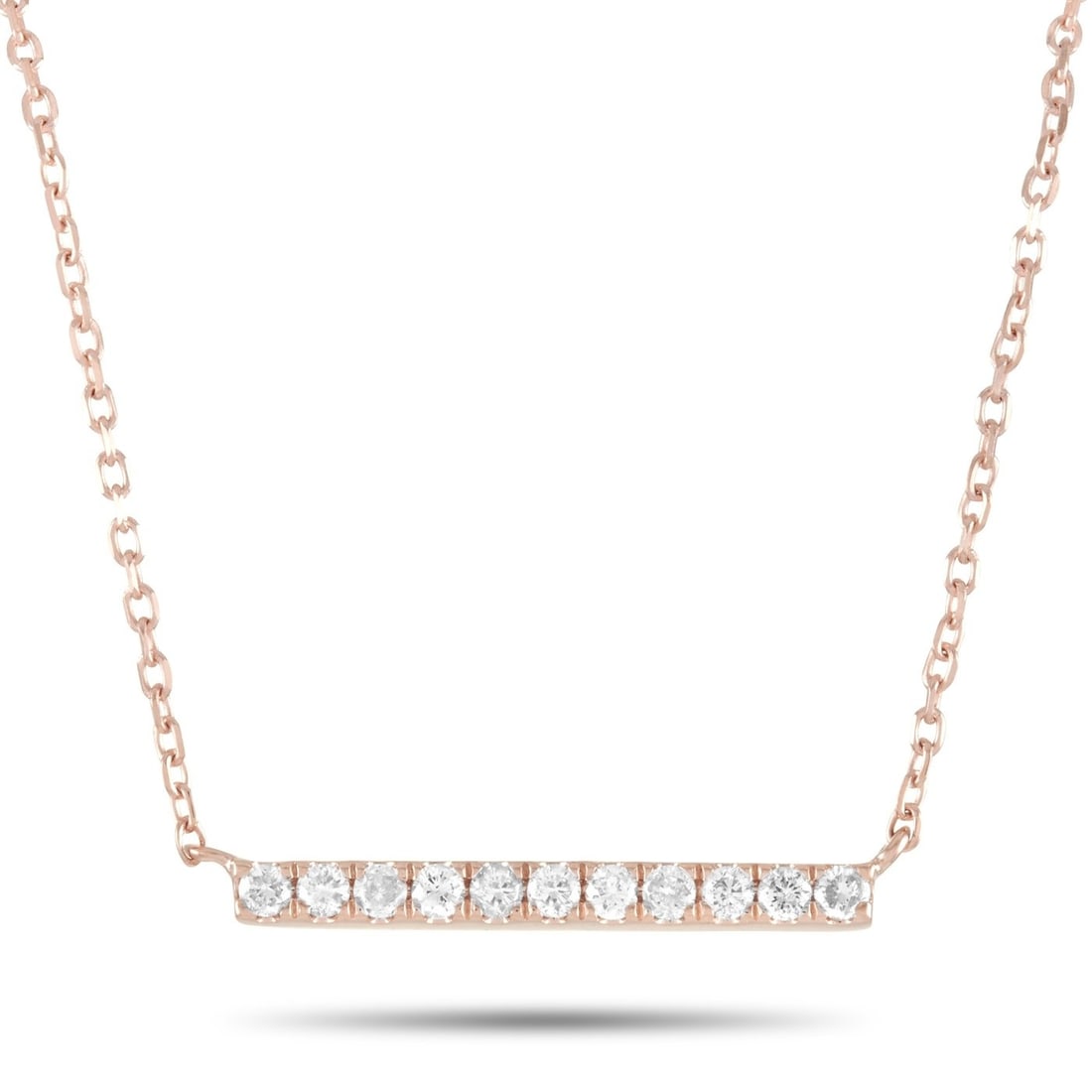 14K Rose Gold 0.10ct Diamond Necklace: 14K Rose Gold 0.10ct Diamond Necklace This necklace is crafted from 14K rose gold and weighs 1.6 grams. It is presented with a 15” chain and boasts a pendant that measures 0.07” in length 