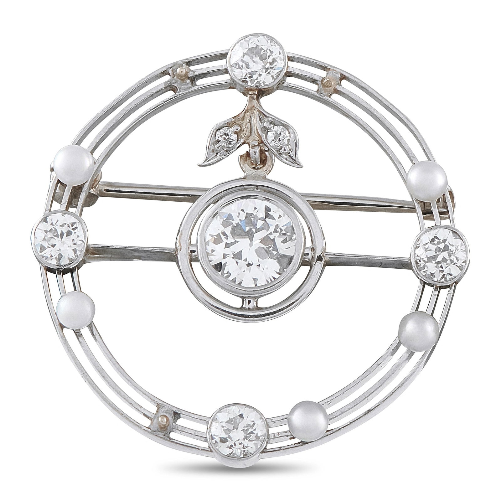 Antique 18K White Gold 0.85ct Diamond and Pearl Round Brooch: This 18K white gold antique-style brooch features a round openwork design centered by a bezel-set diamond, framed by an outer ring that alternates round diamonds and pearls, and accented with a delica