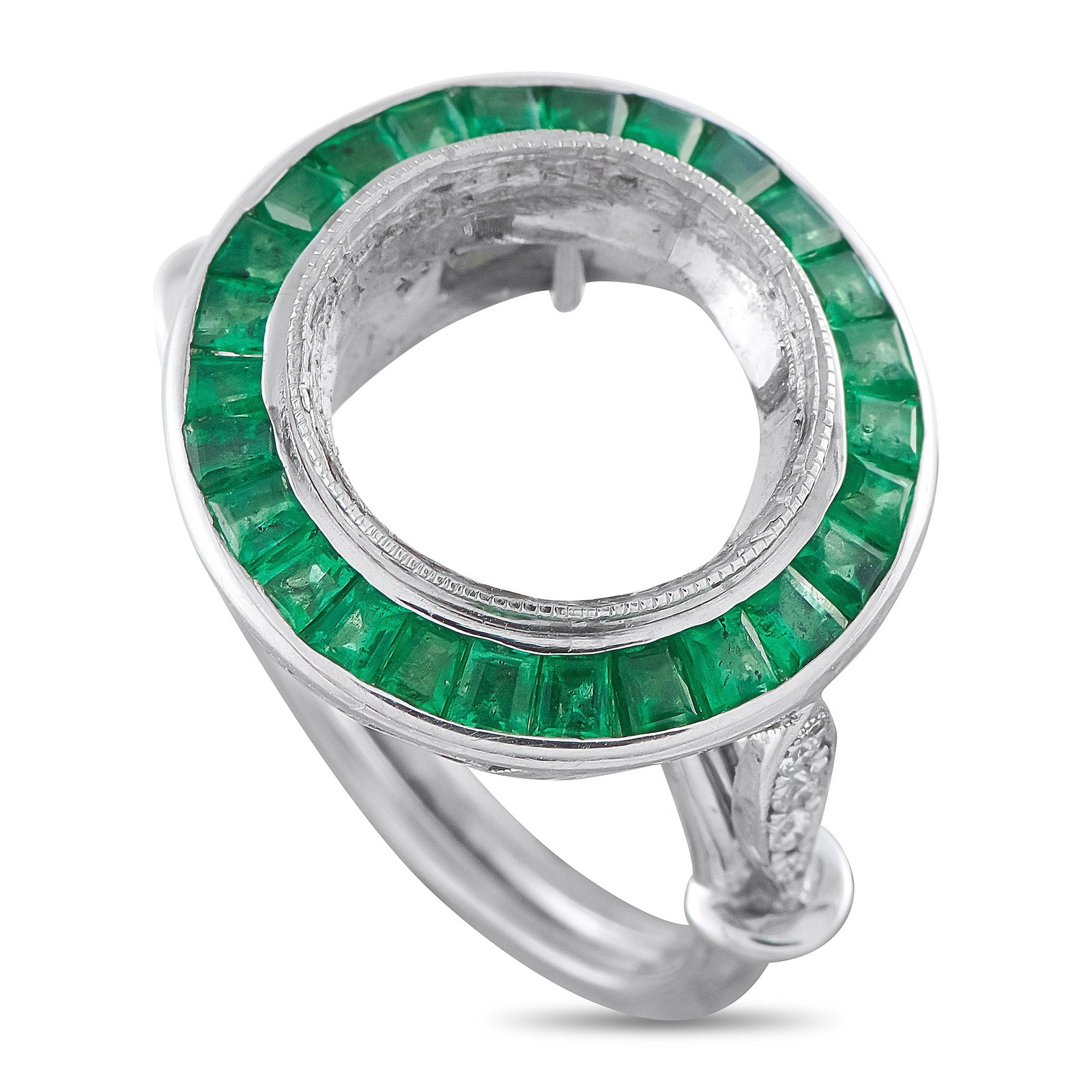 Antique Platinum Diamond and Emerald Mounting Ring: This antique platinum ring mounting features a circular halo of calibre-cut emeralds encircling an open center designed to showcase a center stone, with pave-set diamond accents decorating the pierced