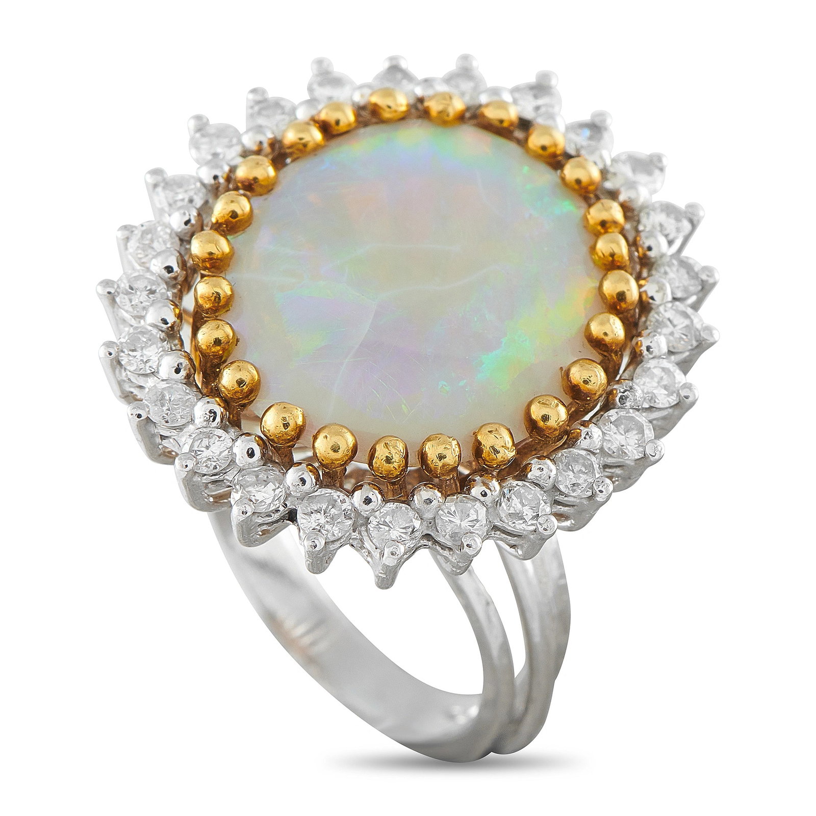 Platinum 0.80ct Diamond and Opal Cocktail Ring: This cocktail ring features a round cabochon opal weighing approximately 7.33 carats, displaying vivid play-of-color, set within a beaded 18K yellow gold gallery. The opal is surrounded by a halo of r