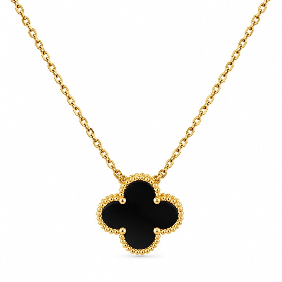 Van Cleef & Arpels Alhambra 18K Yellow Gold Black Onyx Necklace: Van Cleef & Arpels Alhambra 18K Yellow Gold Black Onyx Necklace An elegant matching Van Cleef & Arpels Alhambra set crafted in 18K yellow gold and set with polished black onyx clover motifs. First int