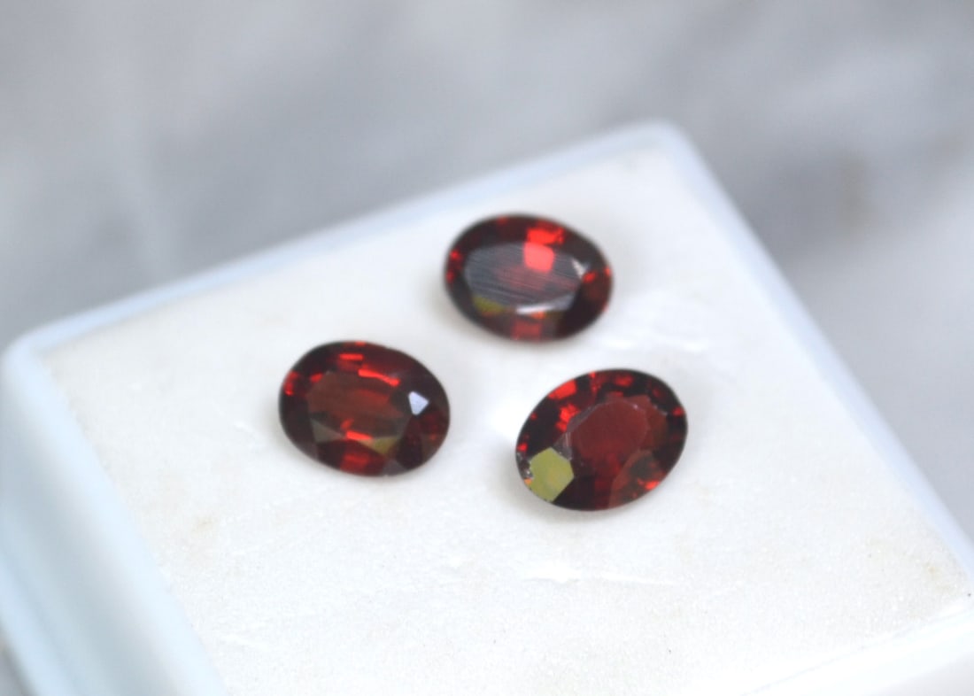 4.33 Carat Matched Trio of Garnets: Bright and beautiful Garnets here. Great set of stones. Natural and untreated. For Proxibid bidders, shipping is a flat rate of $6, no matter how many lots won. For Live Auctioneers bidders, shipping