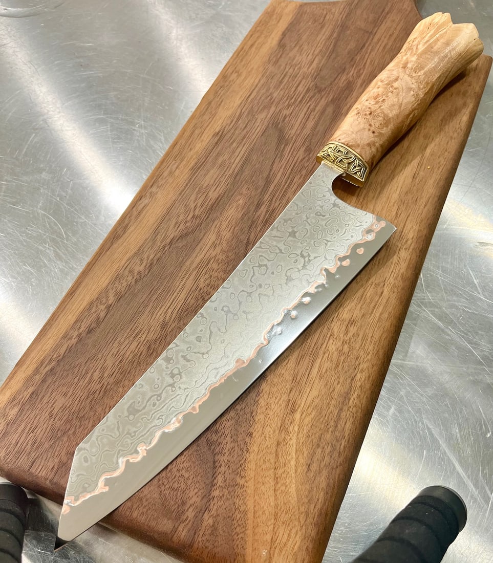 High End, Handmade, Professional Chef Knife with Live Edge Maple Handle: This is a very limited edition, custom made, professional chef knife. Do some searches. You won't find a knife like this anywhere else. Each one is a completely unique work of art. This knife is made