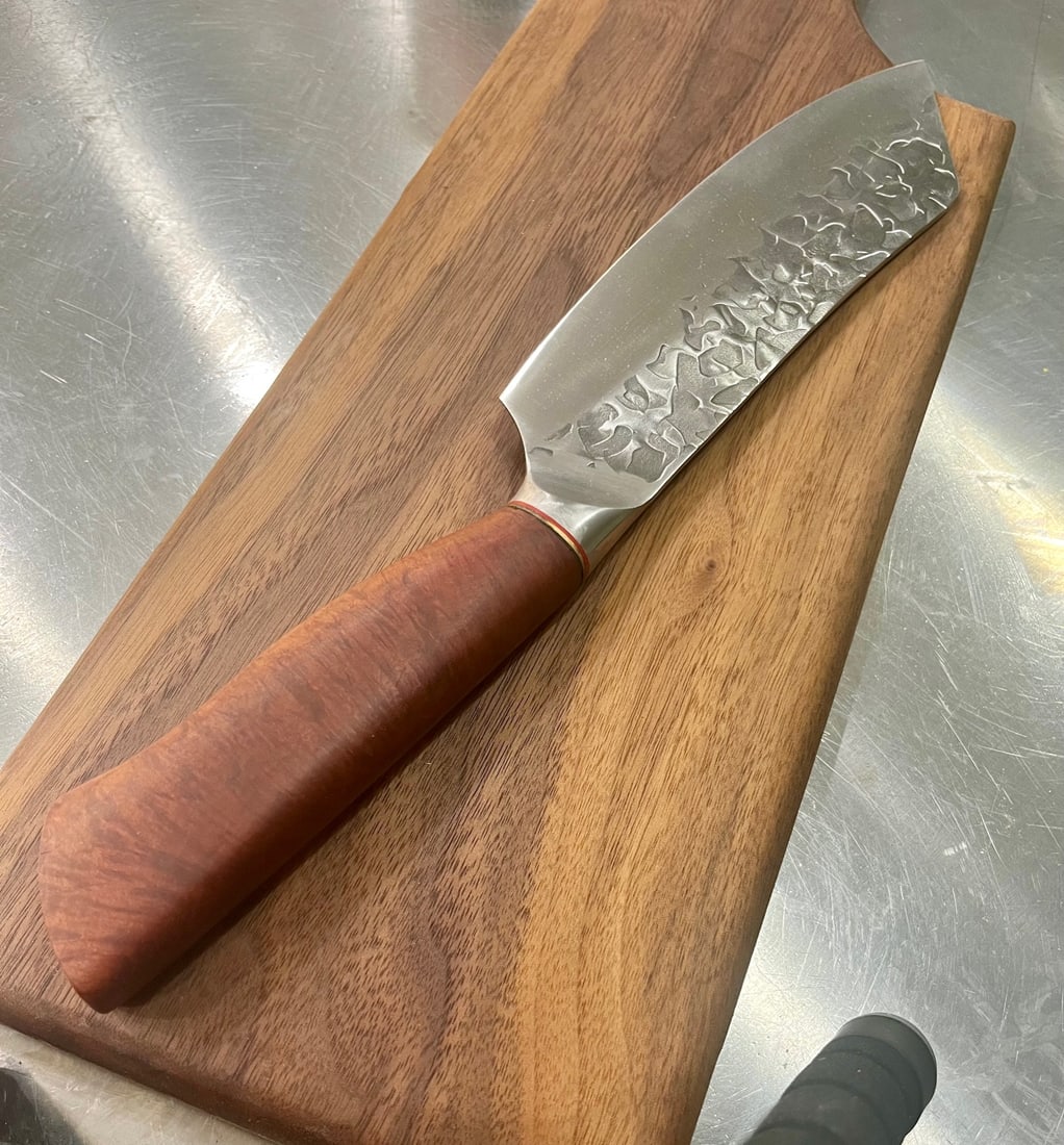 High End, Handmade, Professional Chef Knife with Premium Manzanita Burl Handle: This is a very limited edition, custom made, professional chef knife. Do some searches. You won't find a knife like this anywhere else. Each one is a completely unique work of art. This knife is made