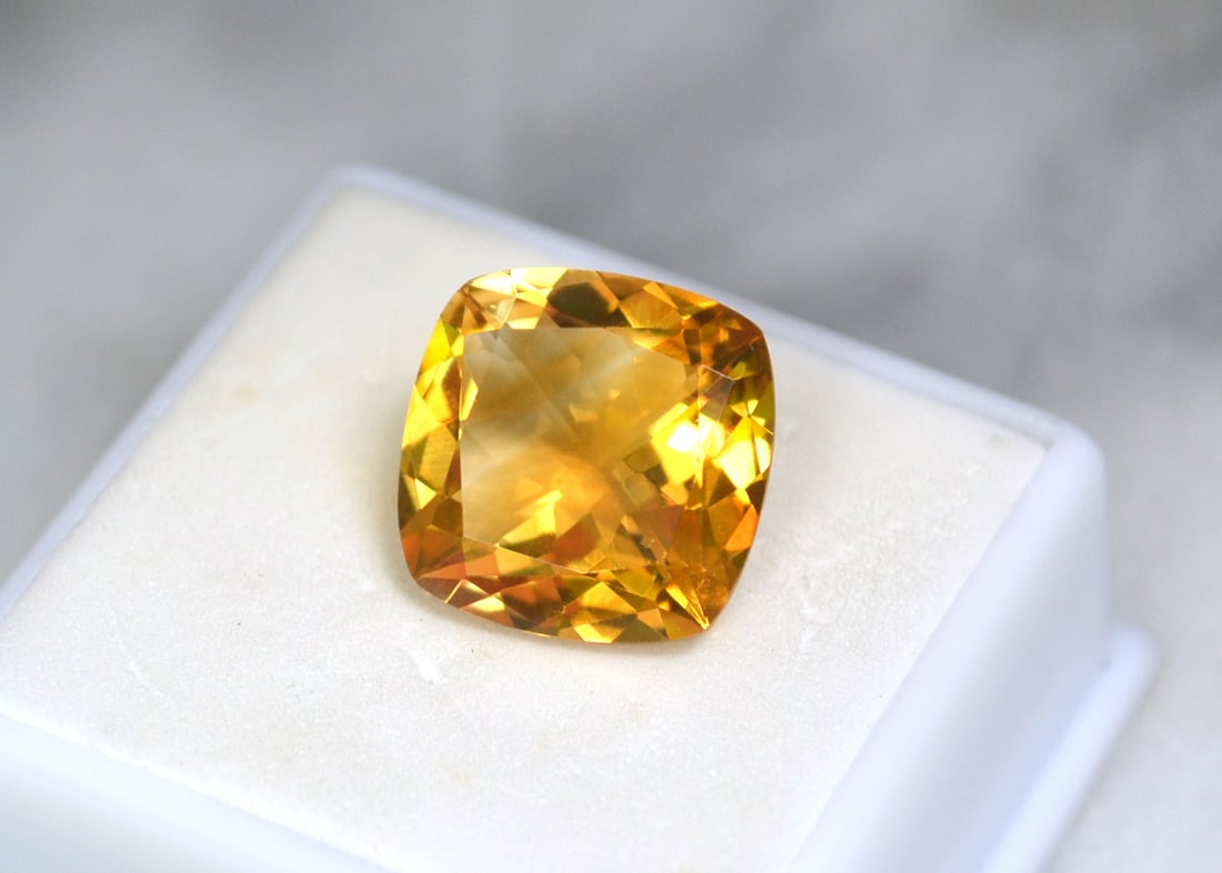 8.46 Carat Cushion Cut Citrine: Gorgeous Citrine. Just a top quality stone. Natural and untreated. For Proxibid bidders, shipping is a flat rate of $6, no matter how many lots won. For Live Auctioneers bidders, shipping will be