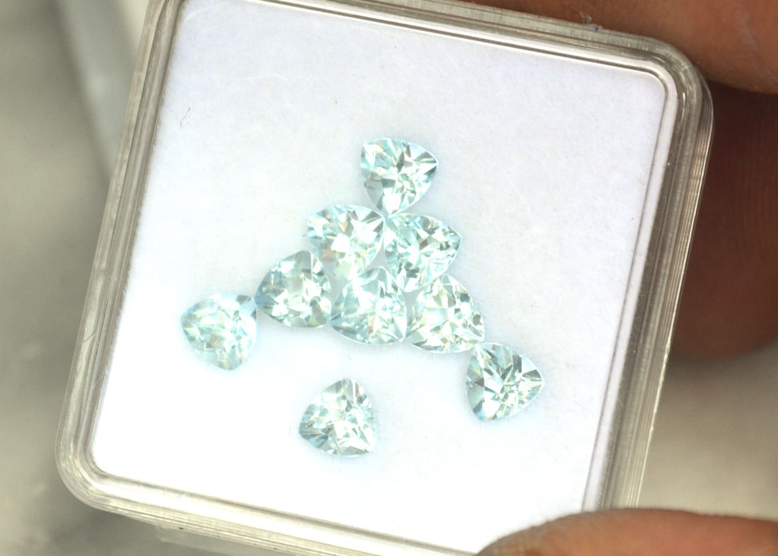 5.00 Carat Matched Set of Trillion Cut Sky Blue Topaz: Fantastic set of Topaz! All great stones. Natural stones but heated and irradiated to get their color, as all Blue Topaz are. For Proxibid bidders, shipping is a flat rate of $6, no matter how many