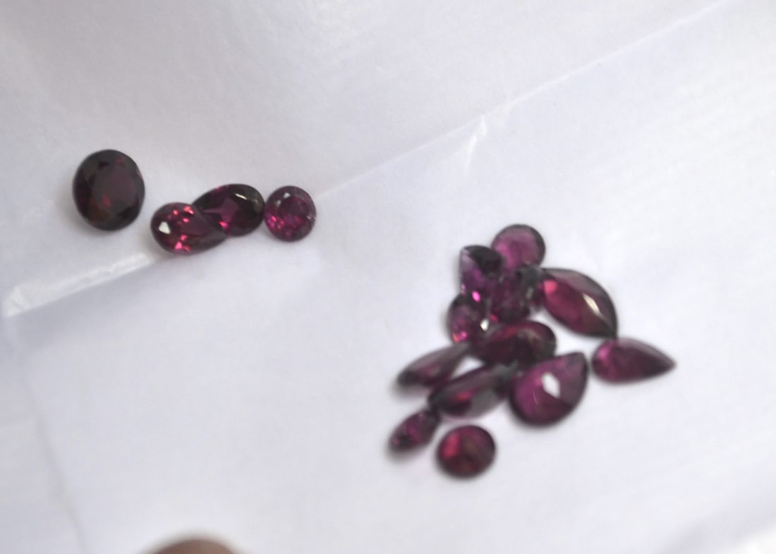 8.67 Carat Set of Rhodolite Garnets: Beautiful Garnets with wonderful shades of Raspberry Red. Natural and untreated. For Proxibid bidders, shipping is a flat rate of $6, no matter how many lots won. For Live Auctioneers bidders,