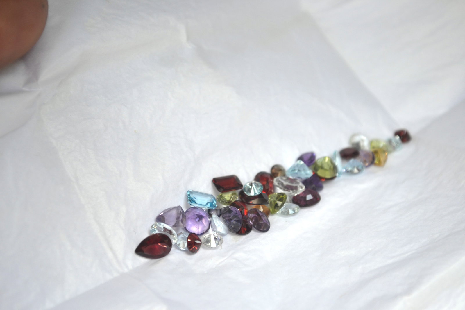 20.56 Carat Set of Mixed Gems: Fine set of gems! All fine stones. No duds. Natural and untreated. For Proxibid bidders, shipping is a flat rate of $6, no matter how many lots won. For Live Auctioneers bidders, shipping will be