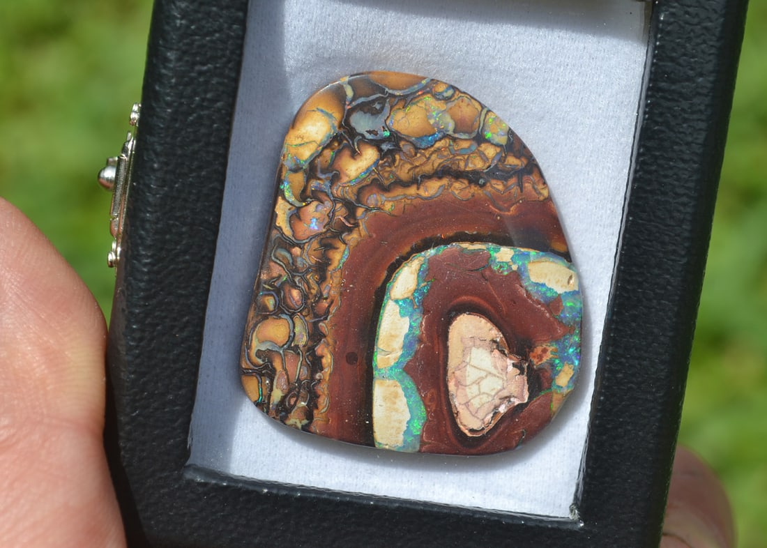 99.51 Carat Australian Koroit Boulder Opal: Amazing Opal here!! Huge with lots of color. Koroit Boulder Opals are highly prized and rare, for obvious reasons. They command some of the highest prices of any Opals in the world. A stone nearly