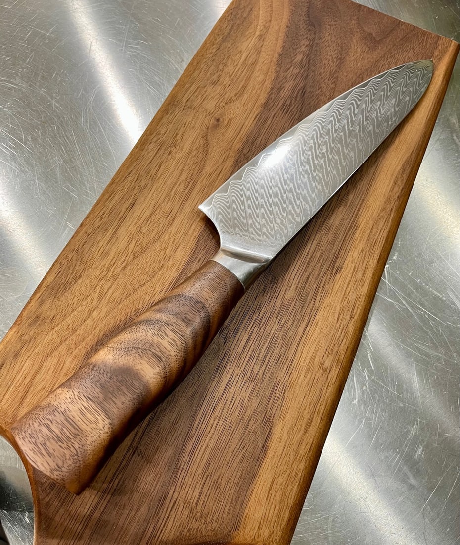 High End, Handmade, Professional Chef Knife with Black Walnut Handle: This is a very limited edition, custom made, professional chef knife. Do some searches. You won't find a knife like this anywhere else. Each one is a completely unique work of art. This knife is made 