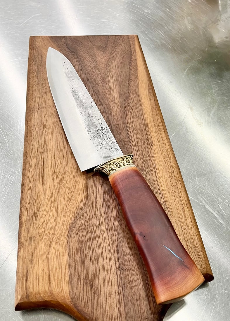 High End, Handmade, Professional Chef Knife with Manzanita Handle: This is a very limited edition, custom made, professional chef knife. Do some searches. You won't find a knife like this anywhere else. Each one is a completely unique work of art. This knife is made