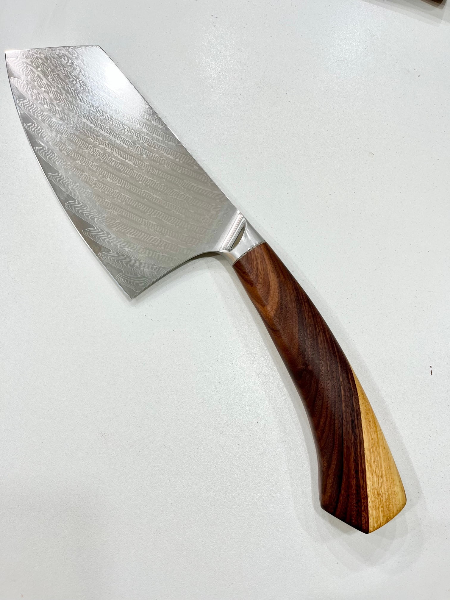 High End, Handmade, Professional Chef Knife with Bolivian Rosewood Handle: This is a very limited edition, custom made, professional chef knife. Do some searches. You won't find a knife like this anywhere else. Each one is a completely unique work of art. This knife is made