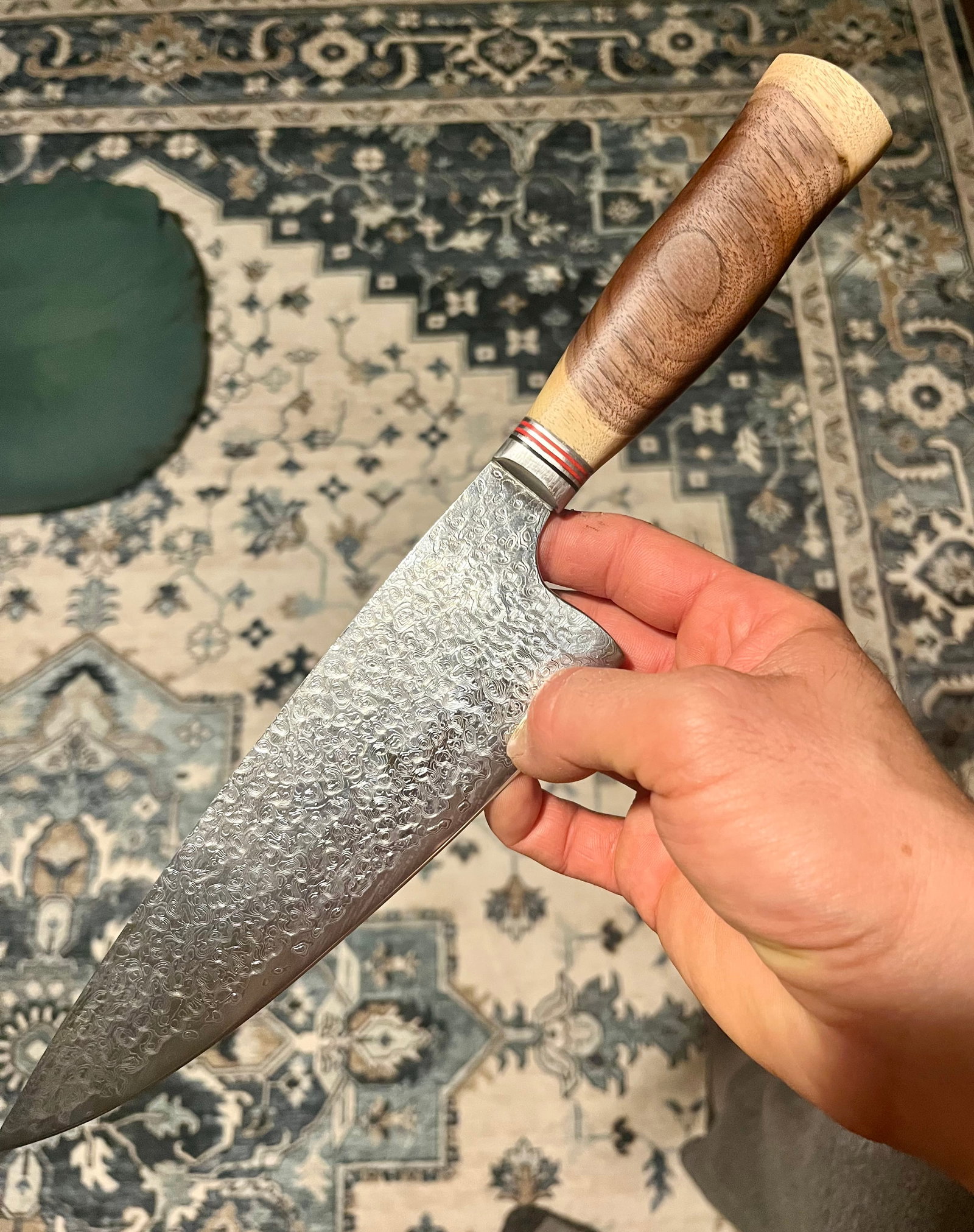 High End, Handmade, Professional Chef Knife with Black Walnut Handle: This is a very limited edition, custom made, professional chef knife. Do some searches. You won't find a knife like this anywhere else. Each one is a completely unique work of art. This knife is made 