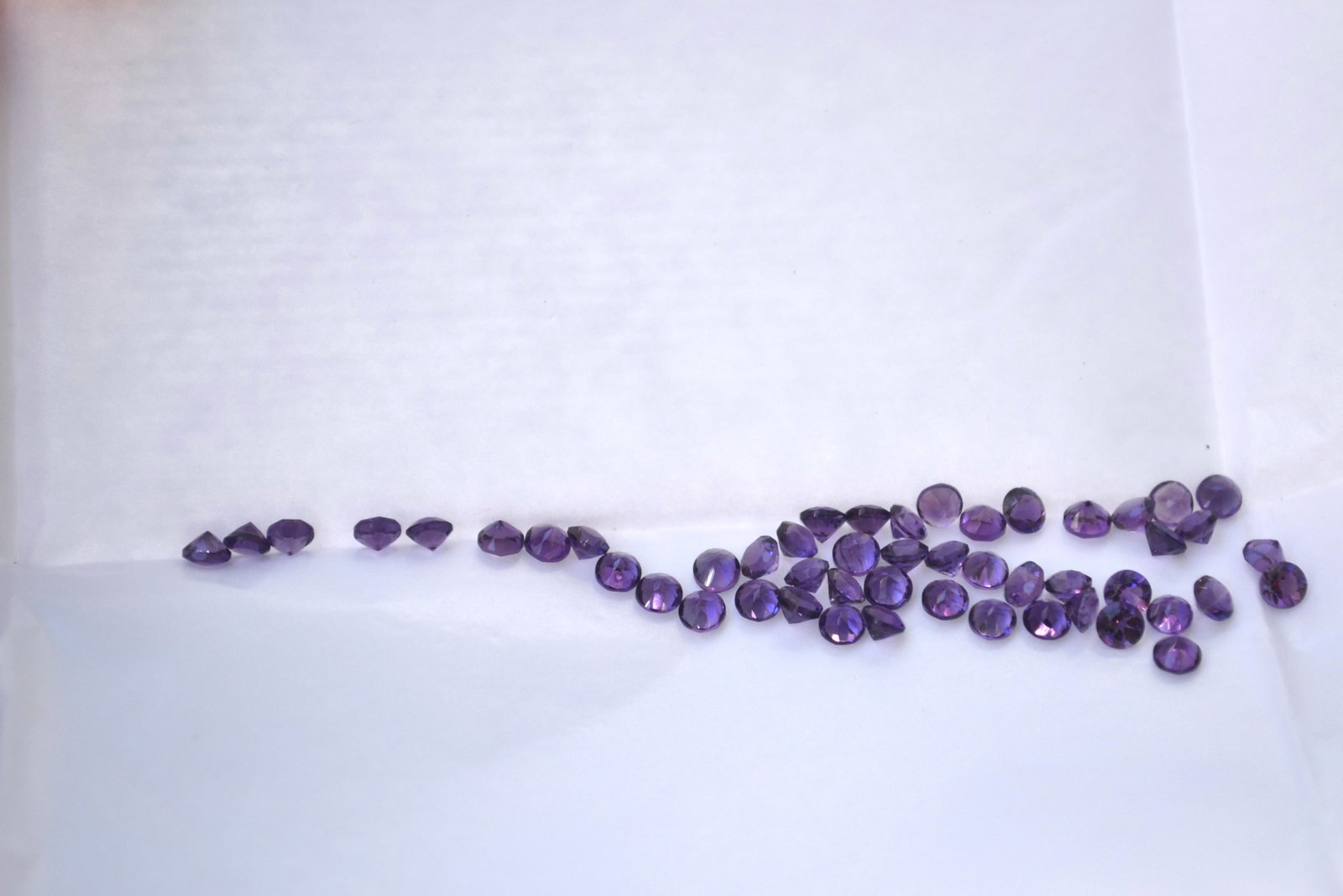5.24 Carat Parcel of Round Cut Amethyst: Gorgeous Amethysts here. Rich color and expertly cut. Lots of value here in terms of accent stones. Natural and untreated. These were originally meant to be sold individually at the price per carat