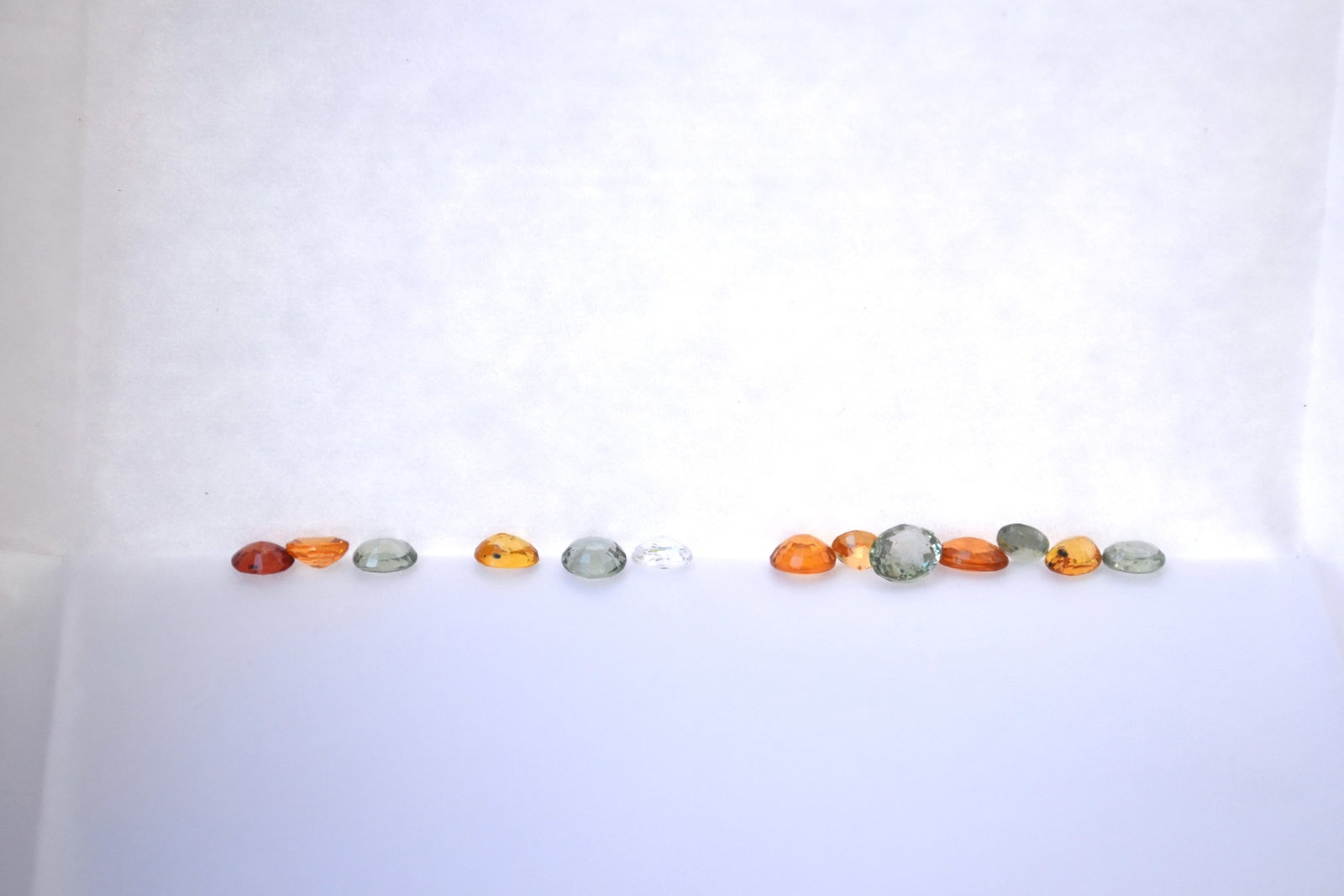 3.45 Carat Parcel of Fancy Colored Sapphires: Beautiful Sapphires. Very strong color, nice cutting and good clarity. All beautiful stones. These are natural stones but have been color enhanced to get their color. These were originally meant to be