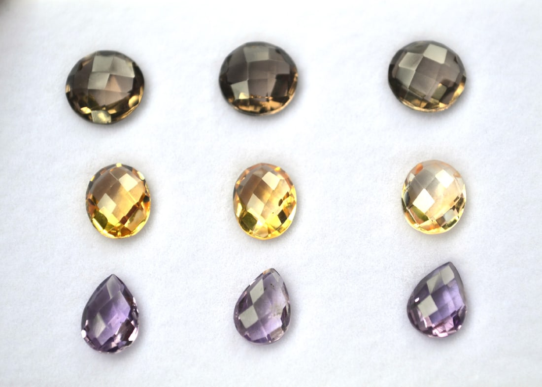 22.13 Carat Set of Jewelry Grade Gems: Gorgeous set of jewelry grade gems here. 9.90 carats of Smoky Quartz. 6.87 carats of Citrine. And 5.36 carats of Amethyst for a grand total of 22.13 carats. Fantastic cuts, color and clarity. High qua